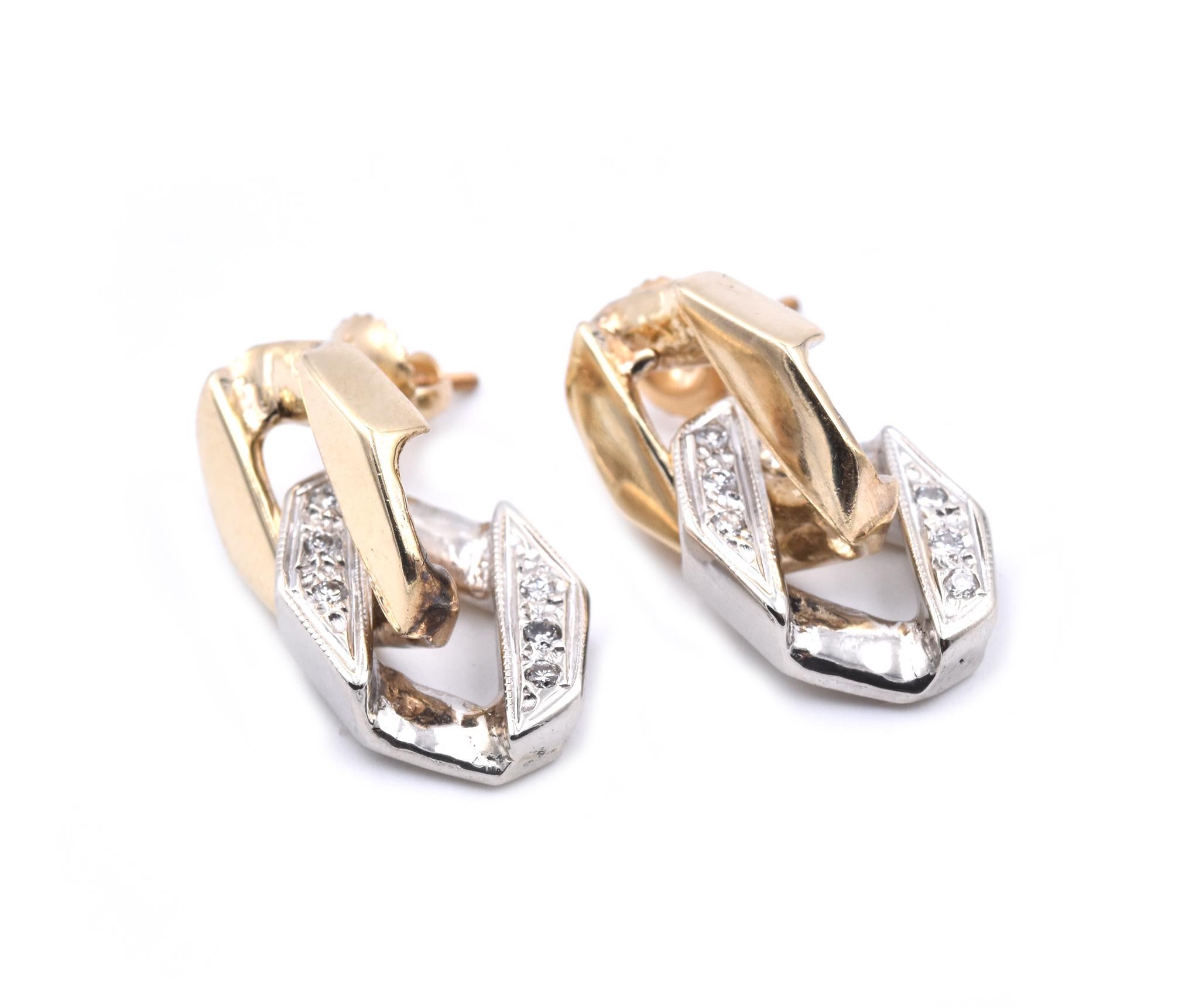 Material: 14k white and yellow gold
Diamonds: 12 round brilliant cuts = .12cttw
Color: G
Clarity: SI1
Dimensions: earrings measure 24.5mm x 10.3mm
Fastenings: screw backs
Weight: 9.18 grams
