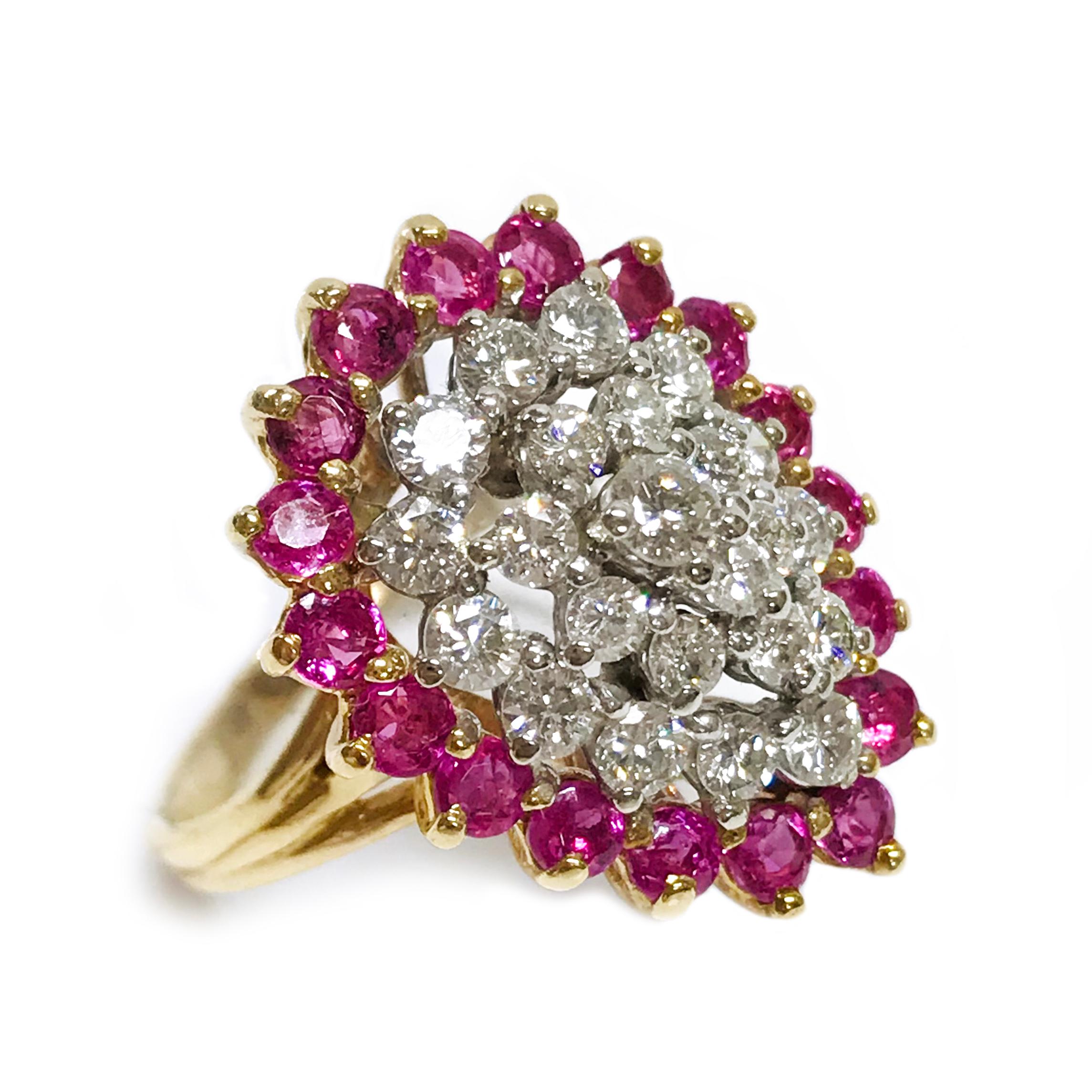 14 Karat Two-Tone Diamond Ruby Cluster Ring. The dazzling split band ring features twenty-three round diamonds and eighteen round medium red rubies all prong set. The raised gallery highlights the pear-shaped formation of the stones. The diamonds