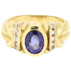 14 Karat Two-Tone Gold 1.77 Carat Oval Sapphire and Diamonds Ring 14 Karat Two-Tone Gold 1.77 Carat Oval Sapphire and Diamonds Ring