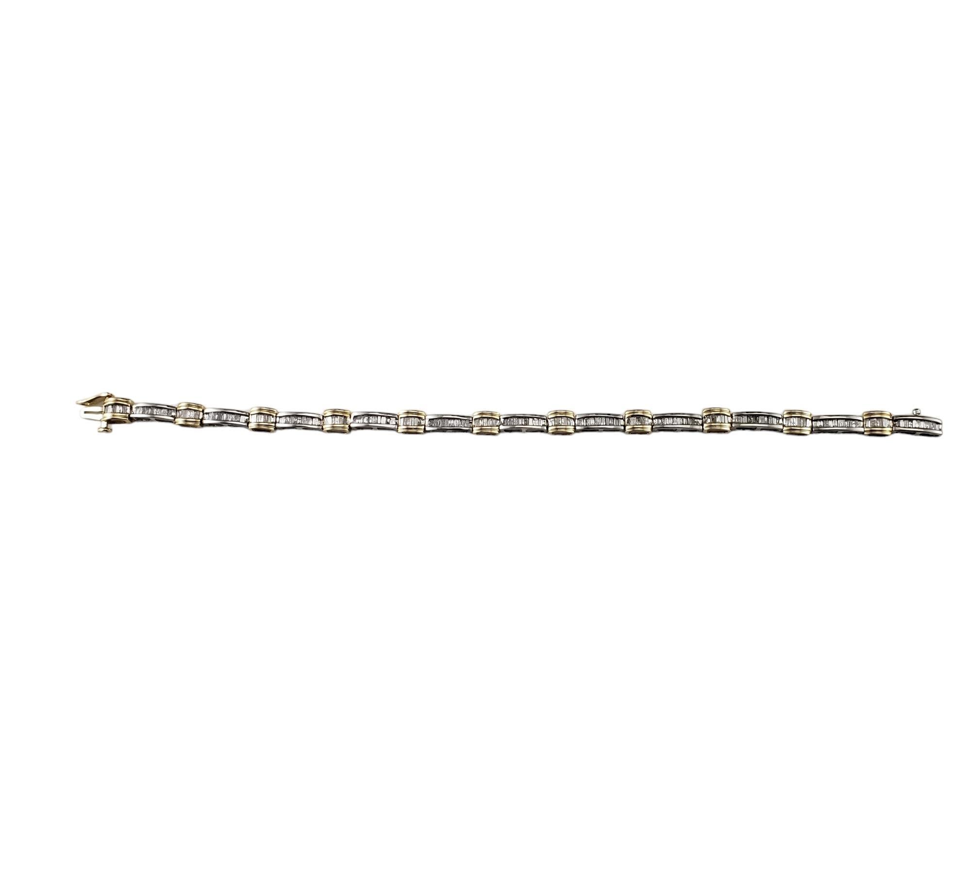14 Karat Two Tone Gold and Diamond Bracelet-

This sparkling bracelet feature 158 baguette cut diamonds set in beautifully detailed 14K yellow and white gold.  

Width: 5 mm.

Approximate total diamond weight: 1.50 ct.

Diamond color: H-I

Diamond