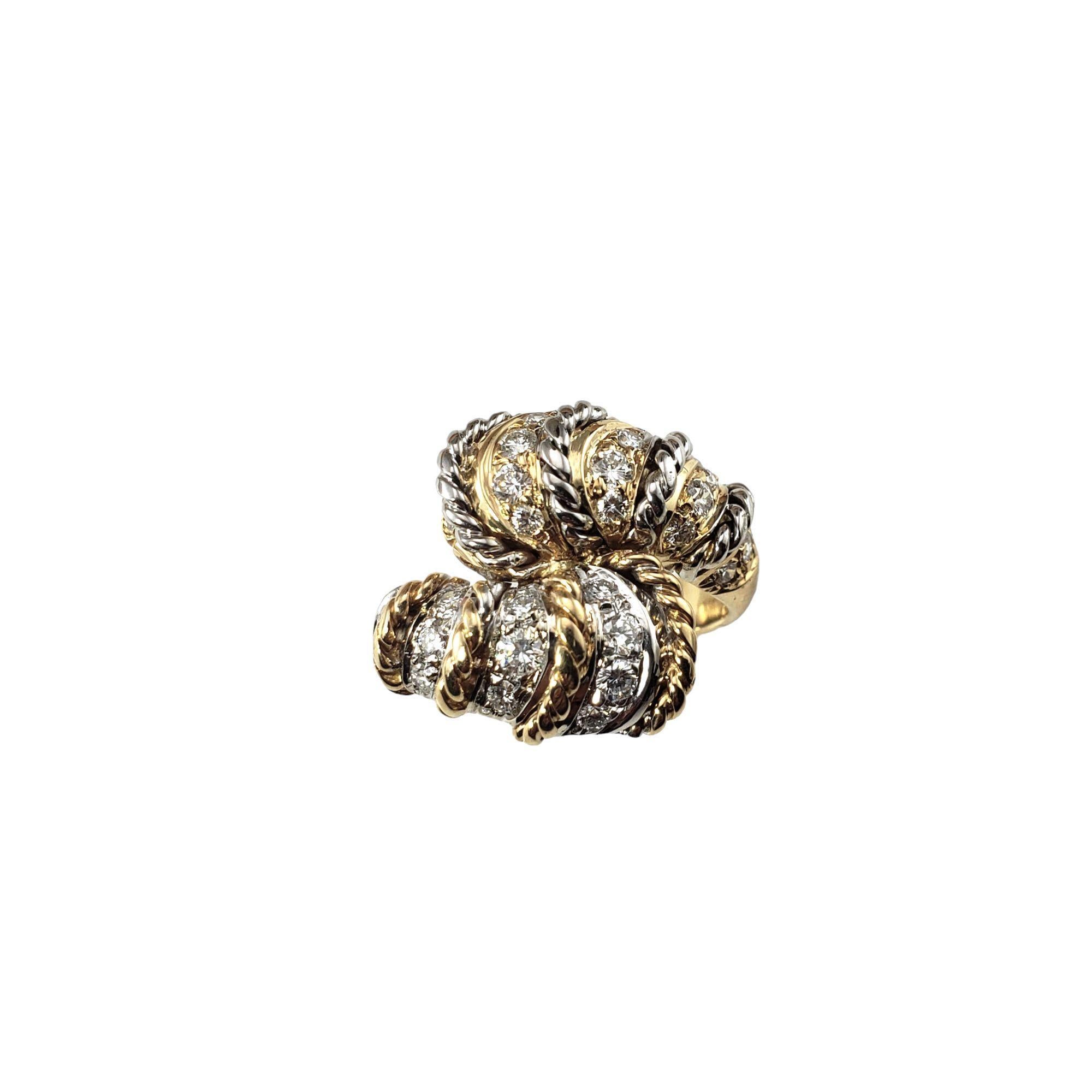 14 Karat Two-Tone Gold and Diamond Ring Size 7-

This sparkling ring features 27 round brilliant cut diamonds set in beautifully detailed 14K yellow and white gold.

Approximate total diamond weight: .80 ct.

Diamond color: G

Diamond