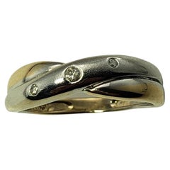 Anello in oro e diamanti 14 carati bicolore