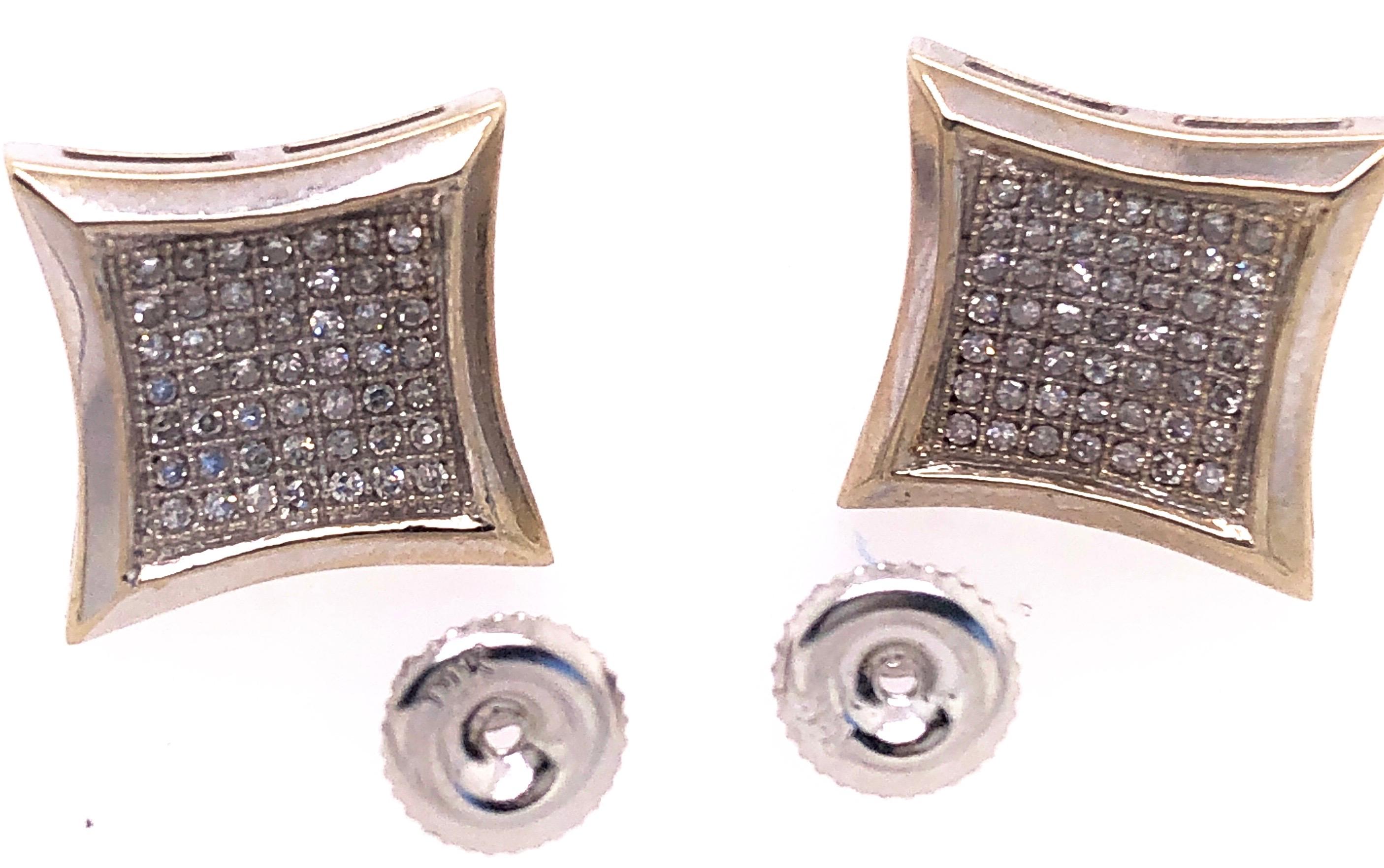 14 Karat Two Tone Gold Button earrings with Diamonds 1.00 Total Diamond Weight..
4 grams total weight