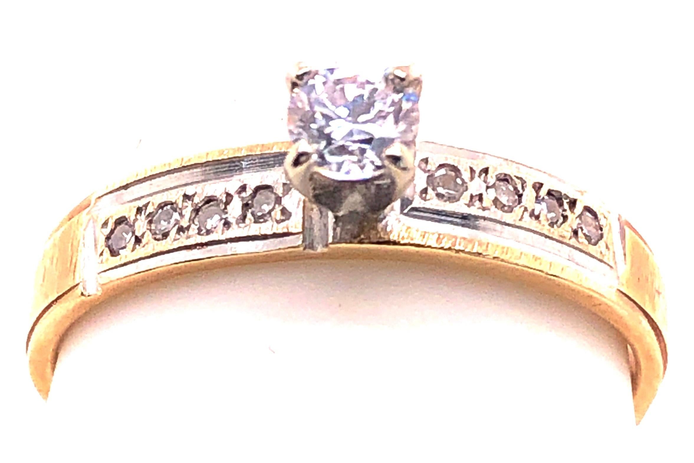 14 Karat Two Tone Gold Engagement Ring 0.58 Total Diamond Weight.
Size 9.5
2.98 grams total weight.