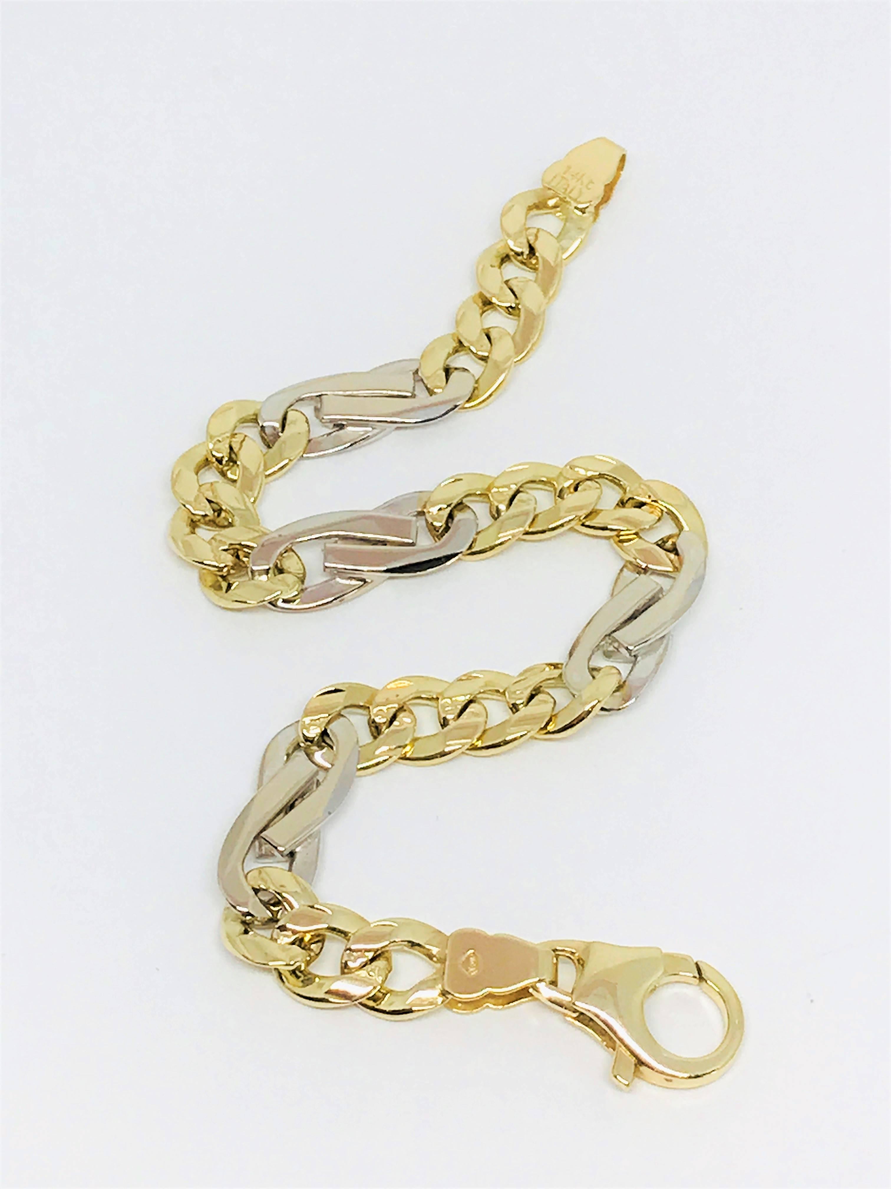 Stunning 14k Two Tone Gold Gent's Curb Link Bracelet. The two tone gold really stands out on this link bracelet!
Length - 8.25 inches
Weight - 27.67 grams
Hallmarked - 14KT ITALY AGSJ