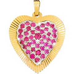 Vintage 14 Karat Two-Tone Gold Love Heart Pendant For Necklace With Red Ruby Gemstones