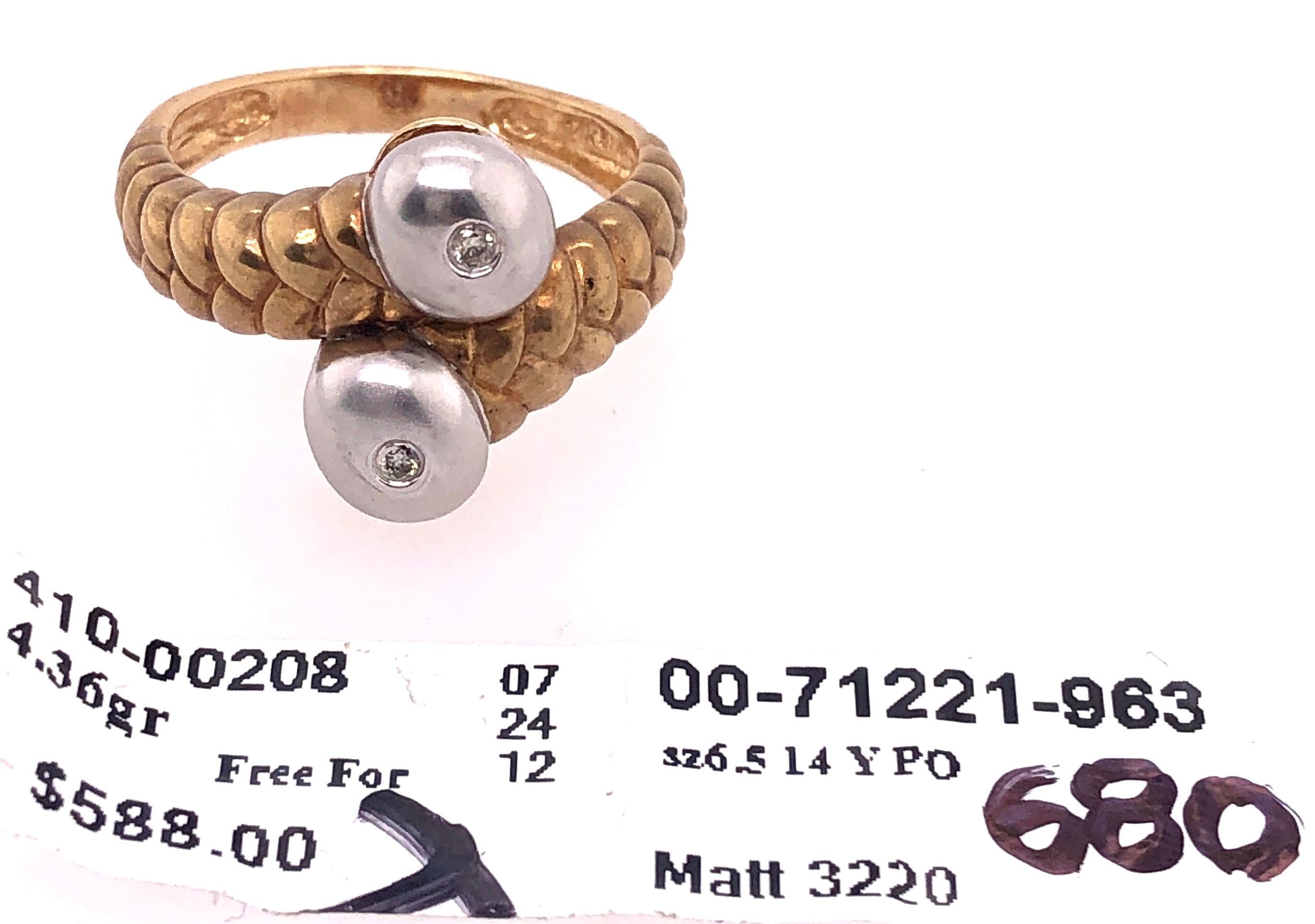 14 Karat Two Tone Gold Matte Finish Fashion Ring.
Size 6.5
4.36 grams total weight.