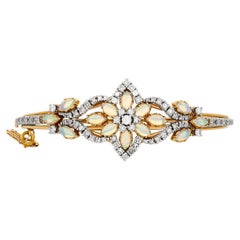14 Karat Two Tone Gold Opal and Diamond Bangle Bracelet