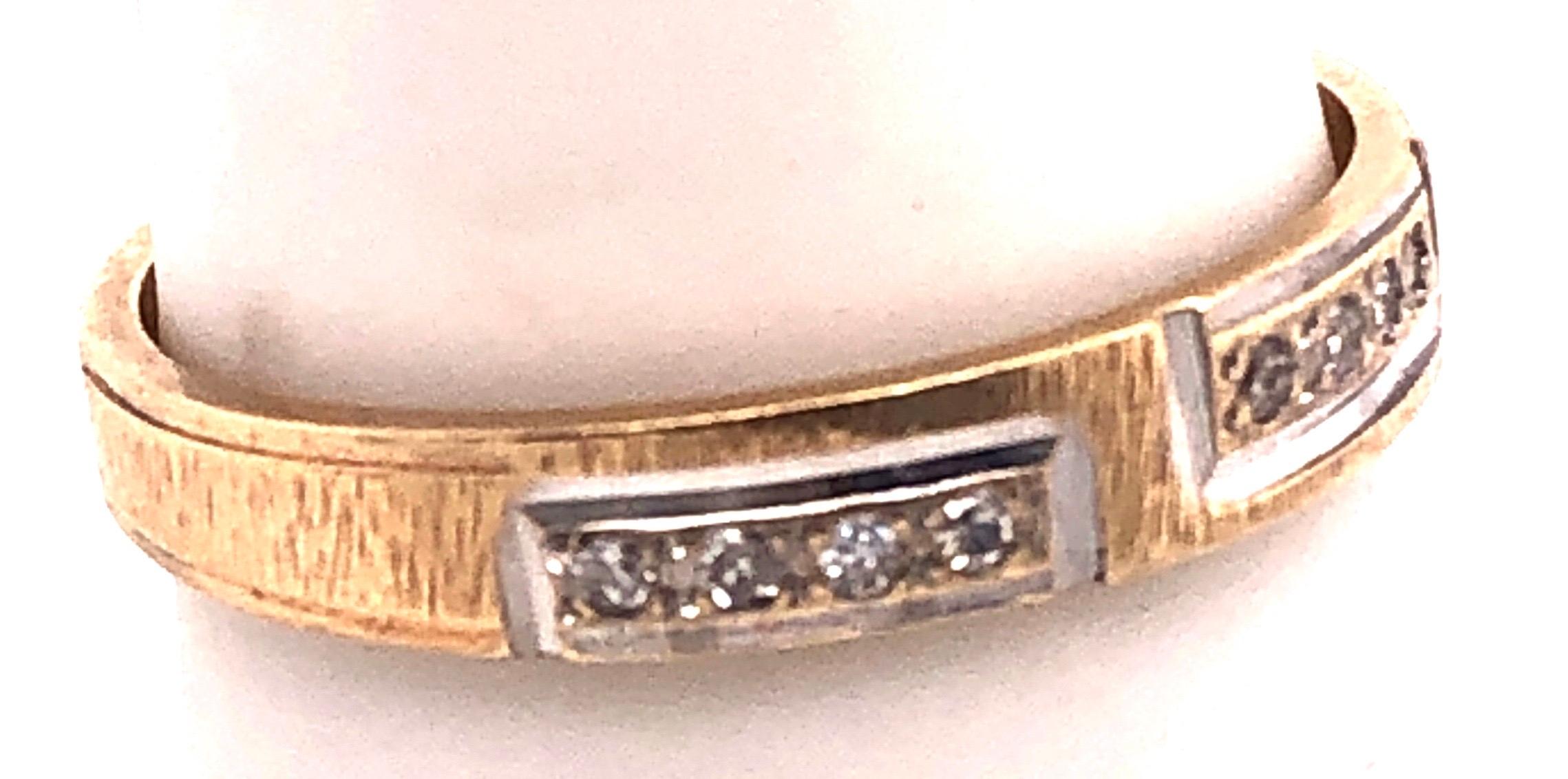 Contemporary 14 Karat Two-Tone Gold Wedding Band with Diamonds 0.25 TDW For Sale
