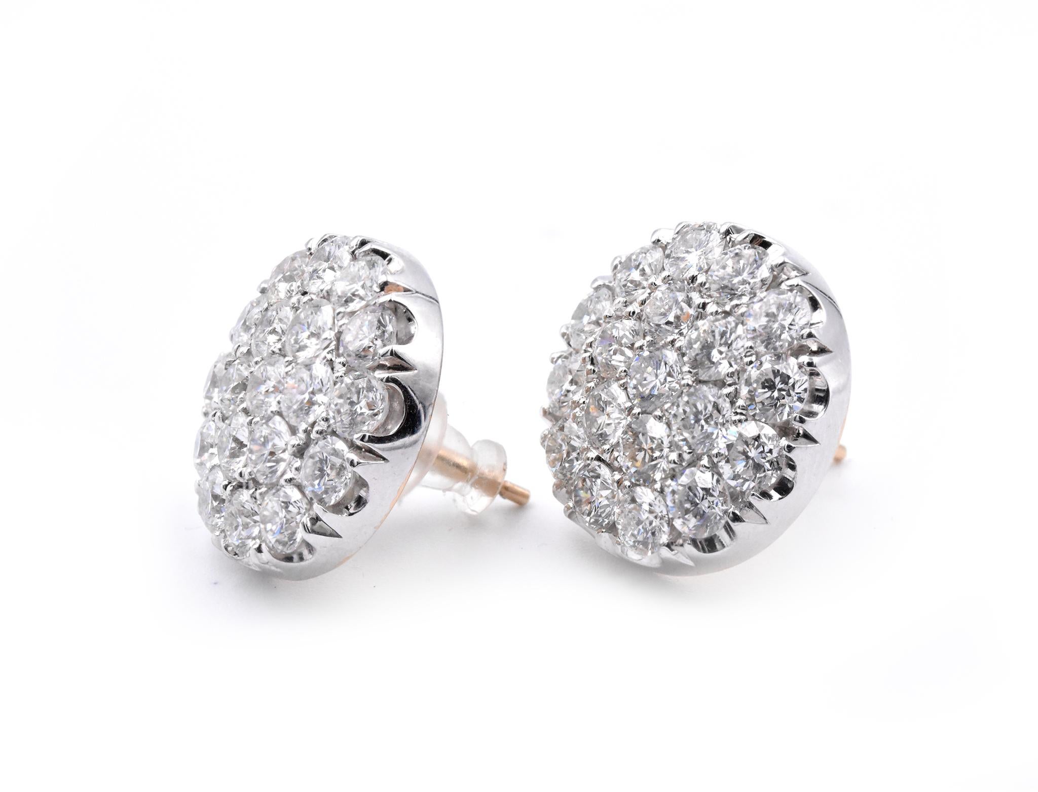 Material: 14k two tone gold
Diamonds: 38 round brilliant cuts = 5.25cttw
Color: G
Clarity: VS
Dimensions: earrings measure 16.65mm in diameter
Fastenings: post with rubber push back
Weight: 9.4 grams