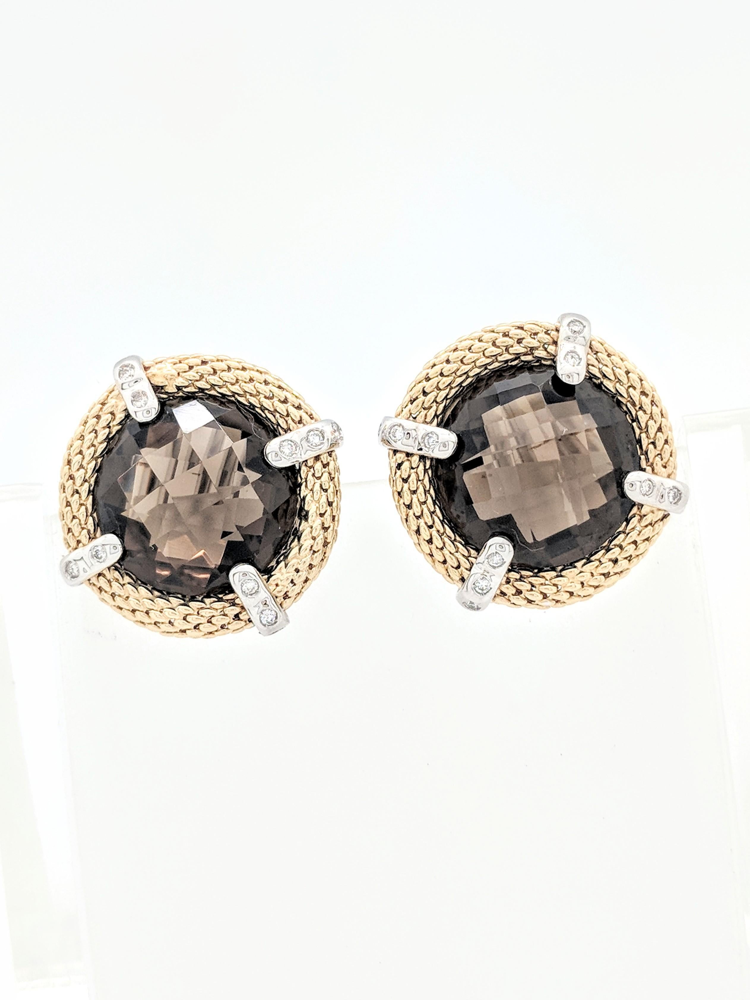 You are viewing a beautiful pair of smoky quartz and diamond earrings. Any woman would love to add this pair to their collection! These earrings are crafted from 14k yellow and white gold and they weigh 155 grams. They each feature (1) 16mm round