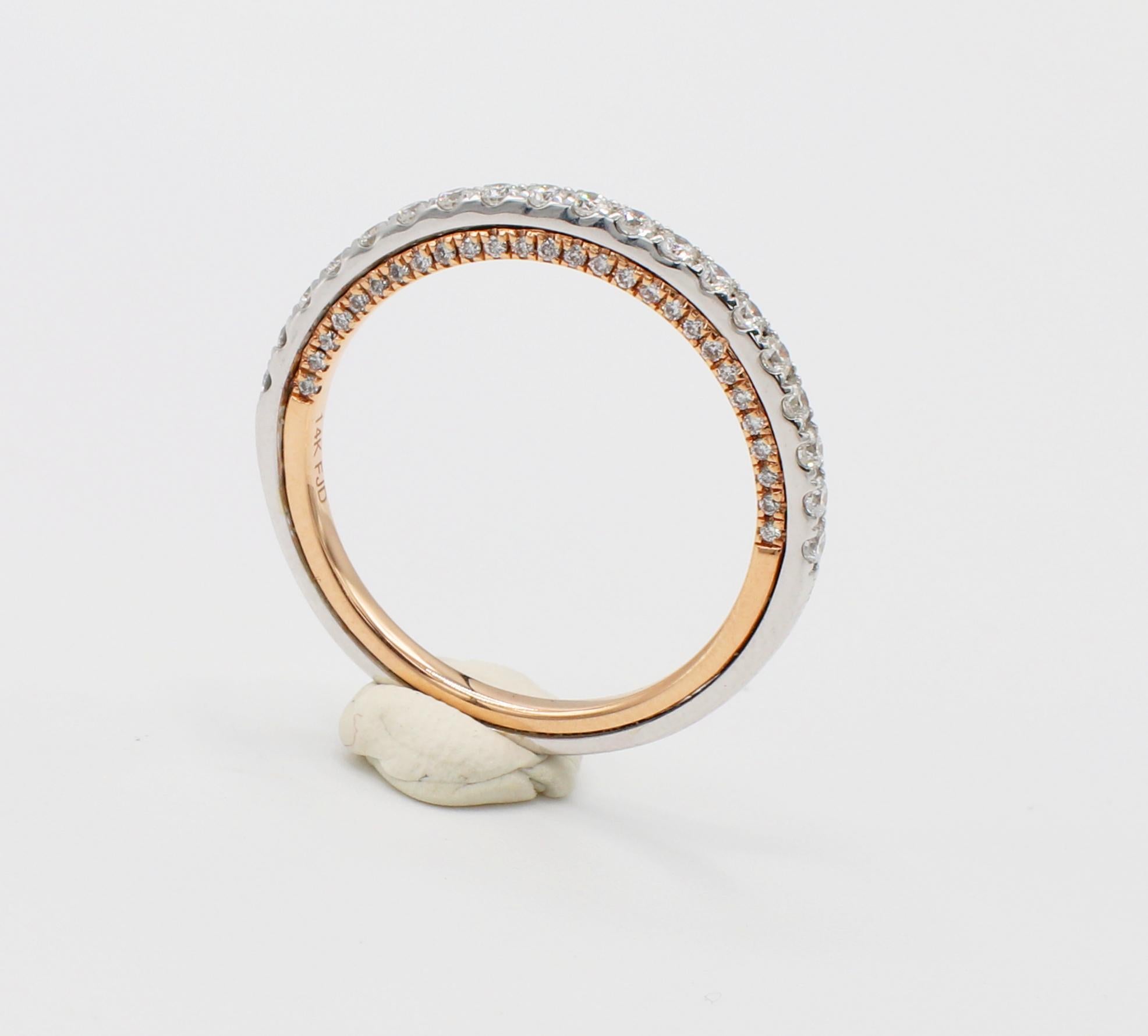 14K White & Rose Gold 0.41ctw 1.75mm Thin Round Brilliant Cut Natural Diamond Wedding Band Hidden Natural Diamonds Ring Size 6

Metal: 14k White & Rose Gold
Diamonds: 73 Round brilliant cut natural diamonds, approx .413 CTW G-H SI
Band is 1.75mm