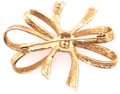 14 Karat Two-Tone Yellow and White Gold Bow Brooch with Diamond Accents