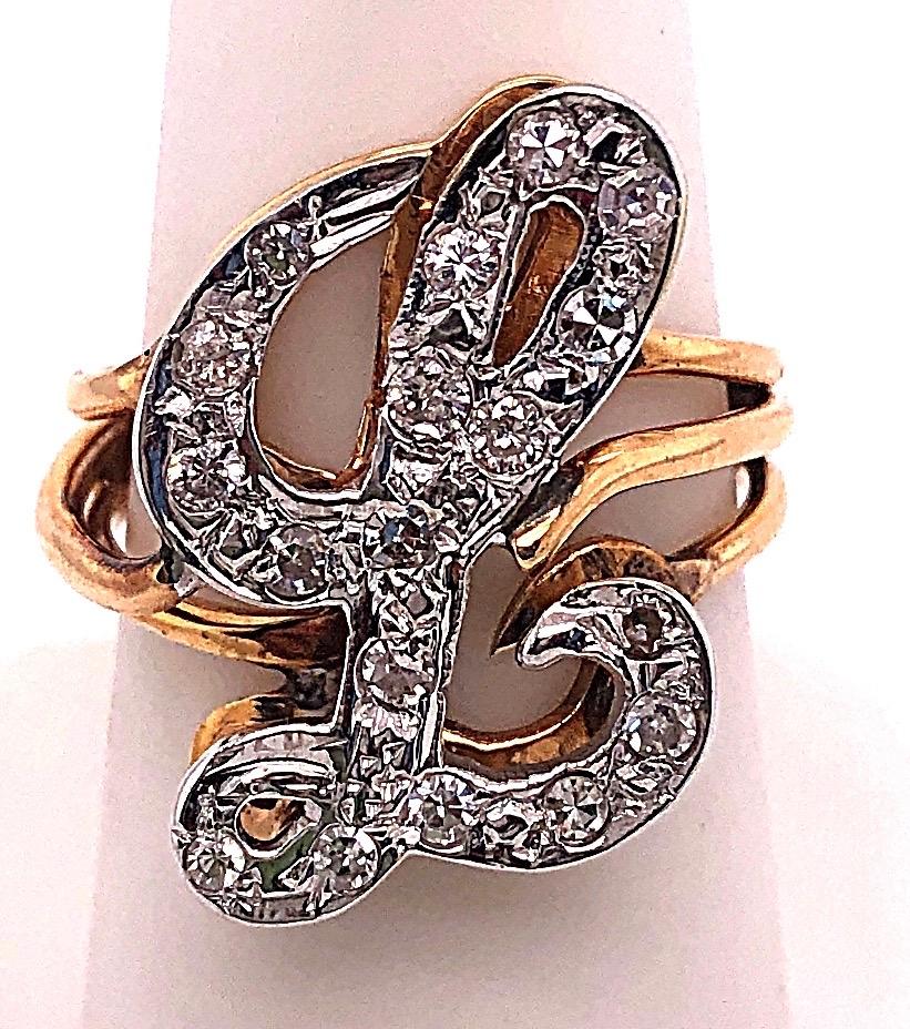 14 Karat Two Tone Yellow and White Gold Diamond Initial L Ring
19 round diamonds with 0.50 total diamond weight.
Size 7 
6 grams total weight.
Initial's height: 23 mm width: 16 mm