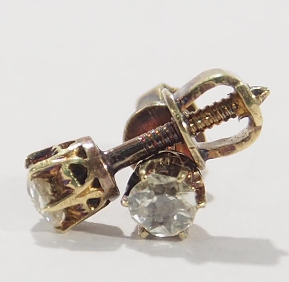 These are a delightful pair of 14K Yellow Gold Diamond Stud Earrings that would delight the Victorian Jewelry Collector. The Diamonds are Old European Cut, approximately 0.15ctw, G-J in Color, SI-I1 in Clarity. The Diamonds sit in an exquisitely