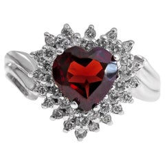 14 Karat Retro Diamond and Garnet Ladies White Gold Ring