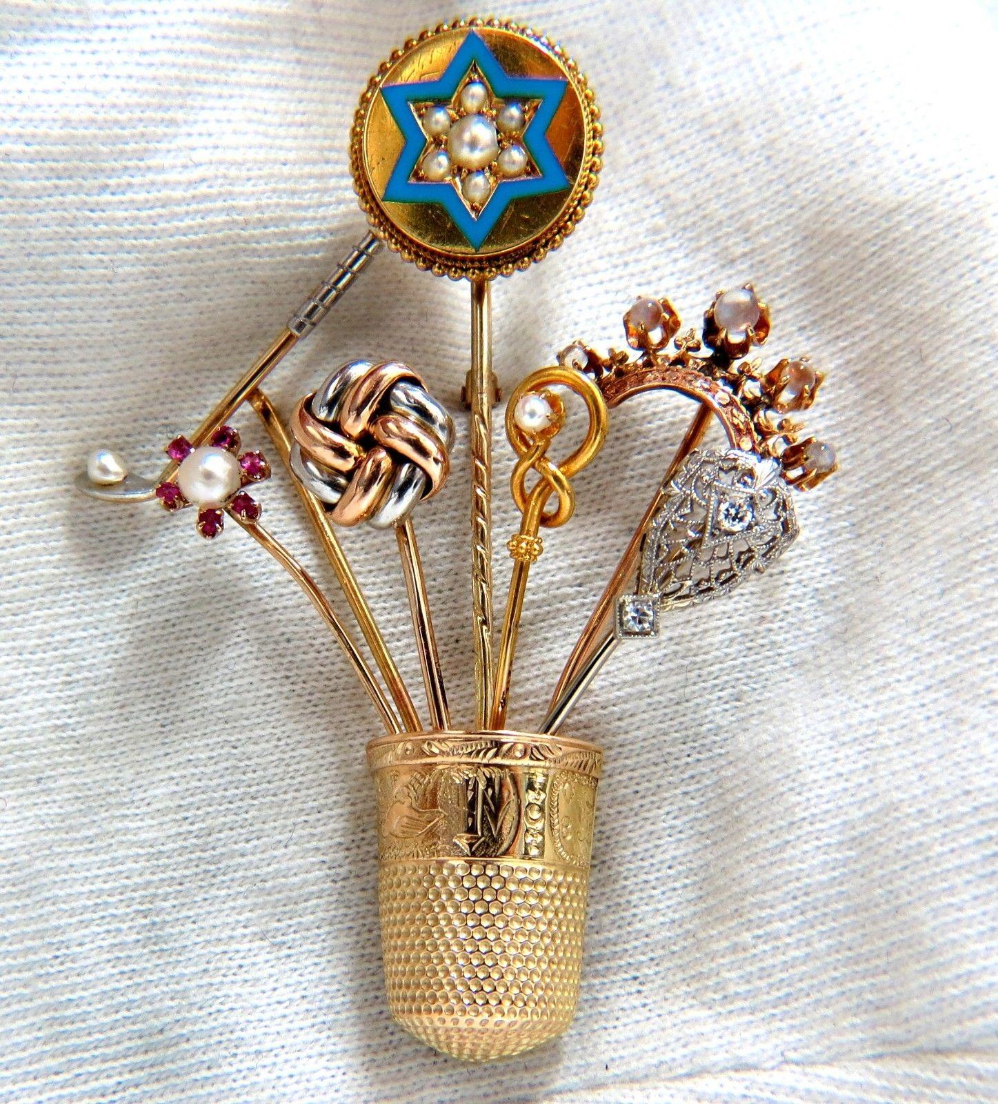 Vintage Seamstress Thimble & Pins

Polo & Pearl

Pearl & Ruby cluster

Love Knot

Infinity & Pearl

Edwardian Filigree & .10ct

British Crown

Star of David & Pearl cluster

  

14kt yellow gold 

18 grams.

Overall: 2.7 X 2 inch