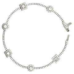 14 Karat Whit Gold 2.34 Carat Natural Diamond 6-Station Halo Tennis Bracelet