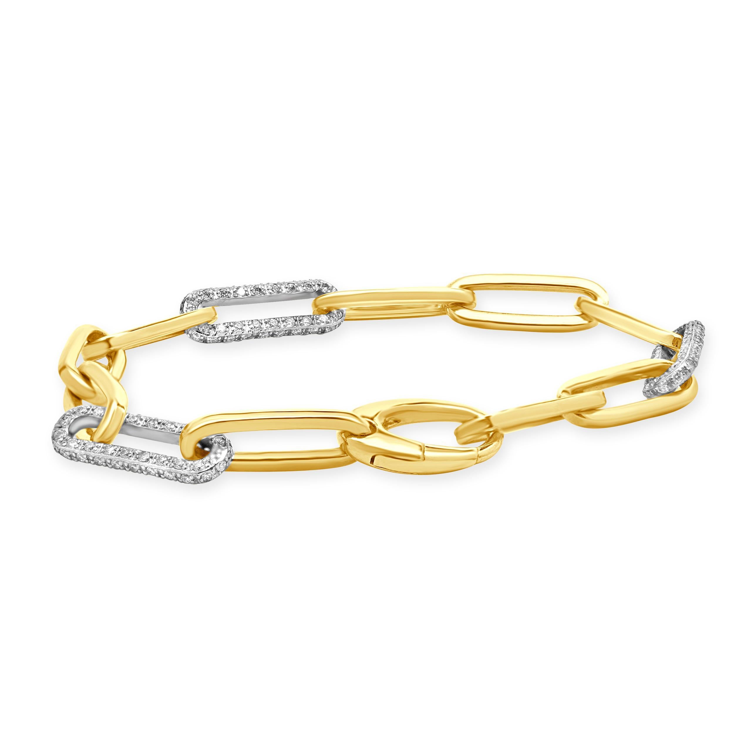 Designer : design personnalisé
MATERIAL : Or blanc et jaune 14K
Diamant : 120 diamants ronds de taille brillant = 1,48cttw
Couleur : G/H
Clarté : VS-SI1
Dimensions : le bracelet convient à un poignet de 7 pouces maximum.
Poids : 9.89 grammes