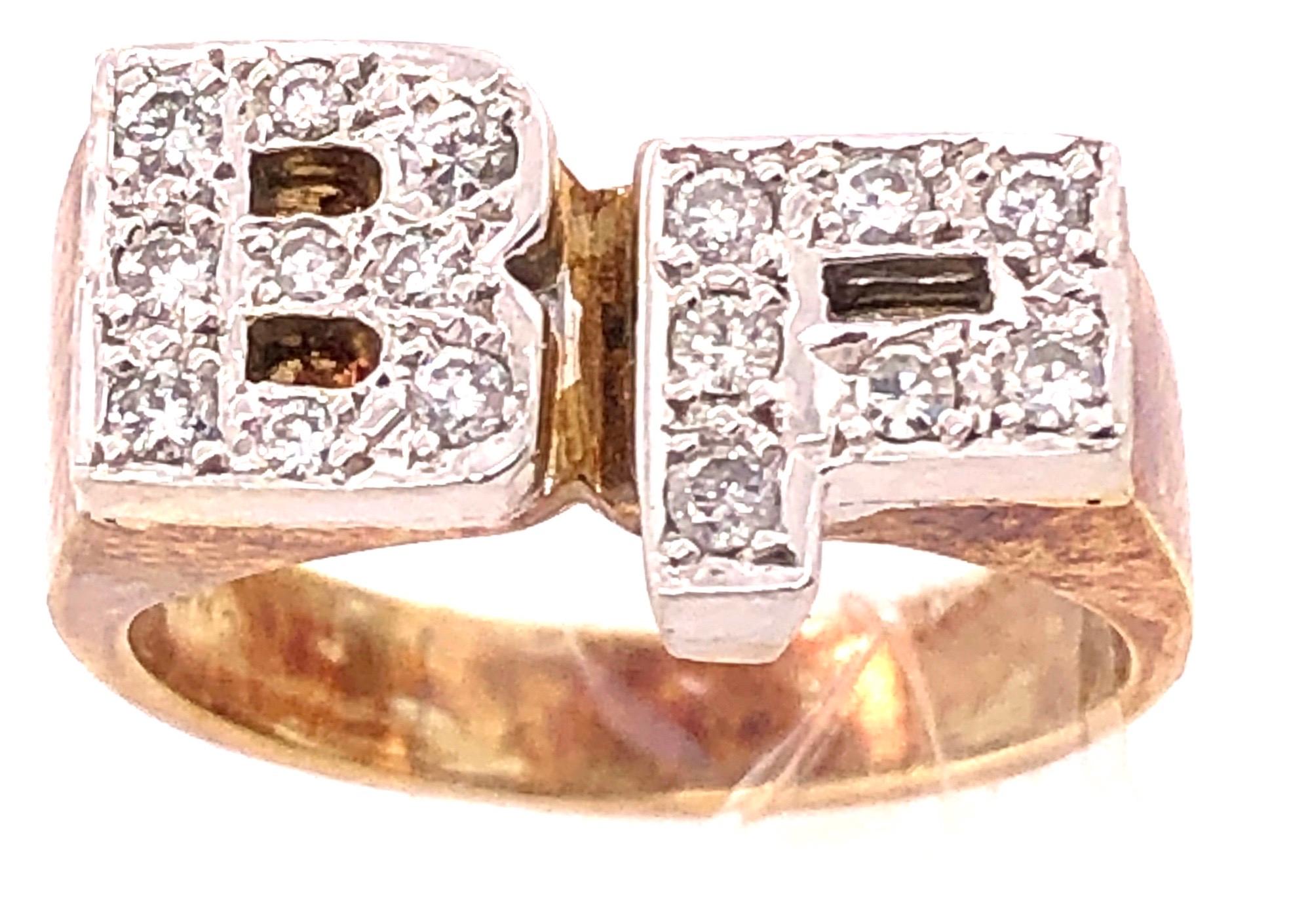 14 Karat White And Yellow Gold and Diamond BP Initial Ring 
Size 4.75
7.5 grams total weight.