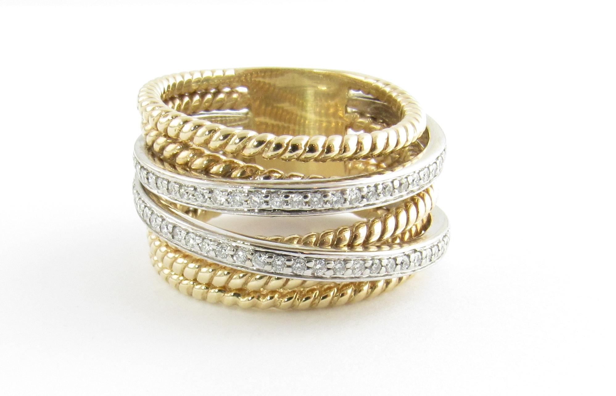Vintage 14 Karat Yellow and White Gold Diamond Multi-Band Ring Size 7.5-

This stunning multi-band ring features 52 round brilliant cut diamonds set in beautifully detailed 14K white and yellow gold. Width: 12 mm.

Approximate total diamond weight: