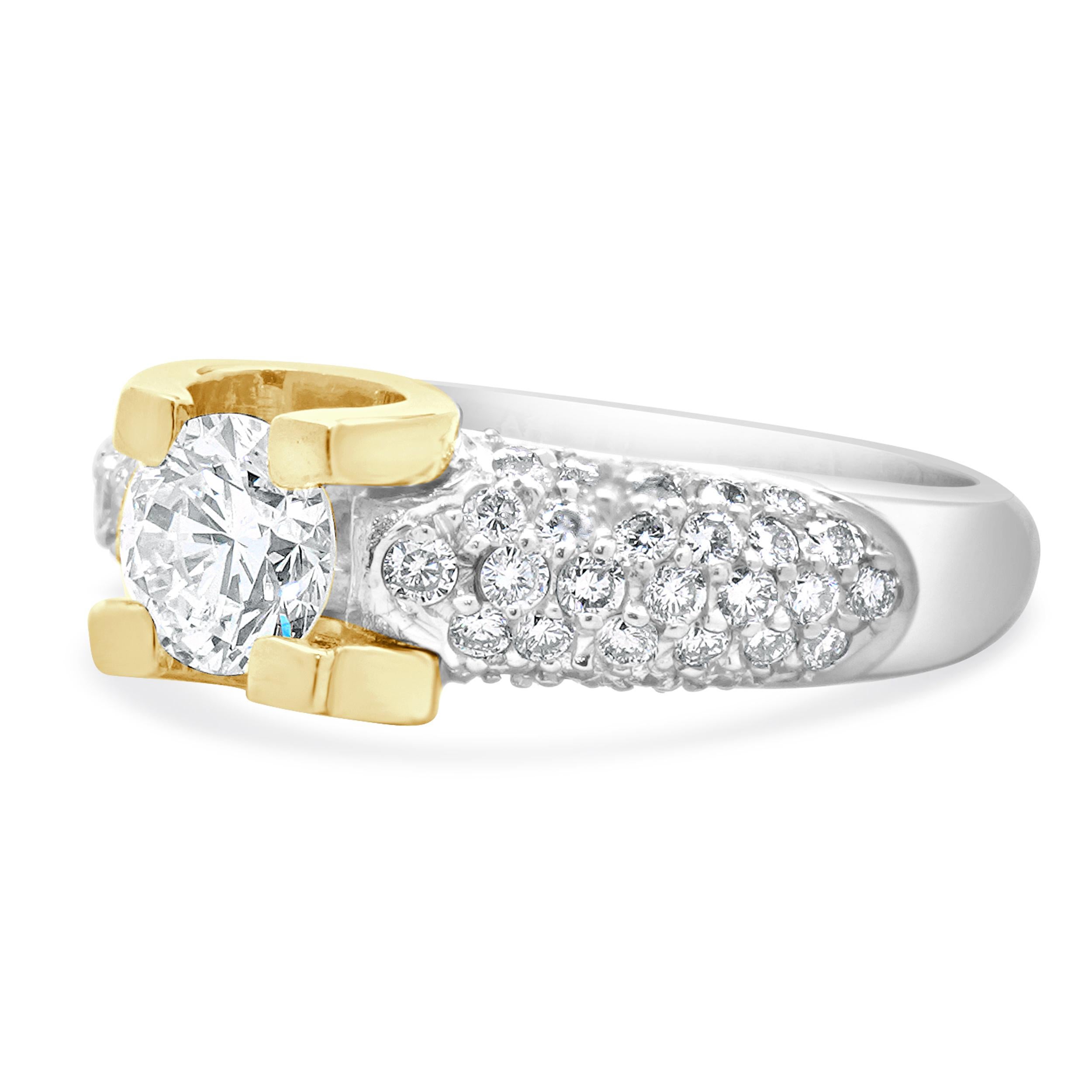 Designer: custom
Material: 14K/18K white & yellow gold
Center Diamond: 1 round brilliant cut = 1.00ct
Color : I
Clarity : I1
Diamonds: 70 round brilliant cut = 0.70cttw
Color: H
Clarity: SI1-2
Size: 8.75 complimentary sizing available 
Weight: 8.96