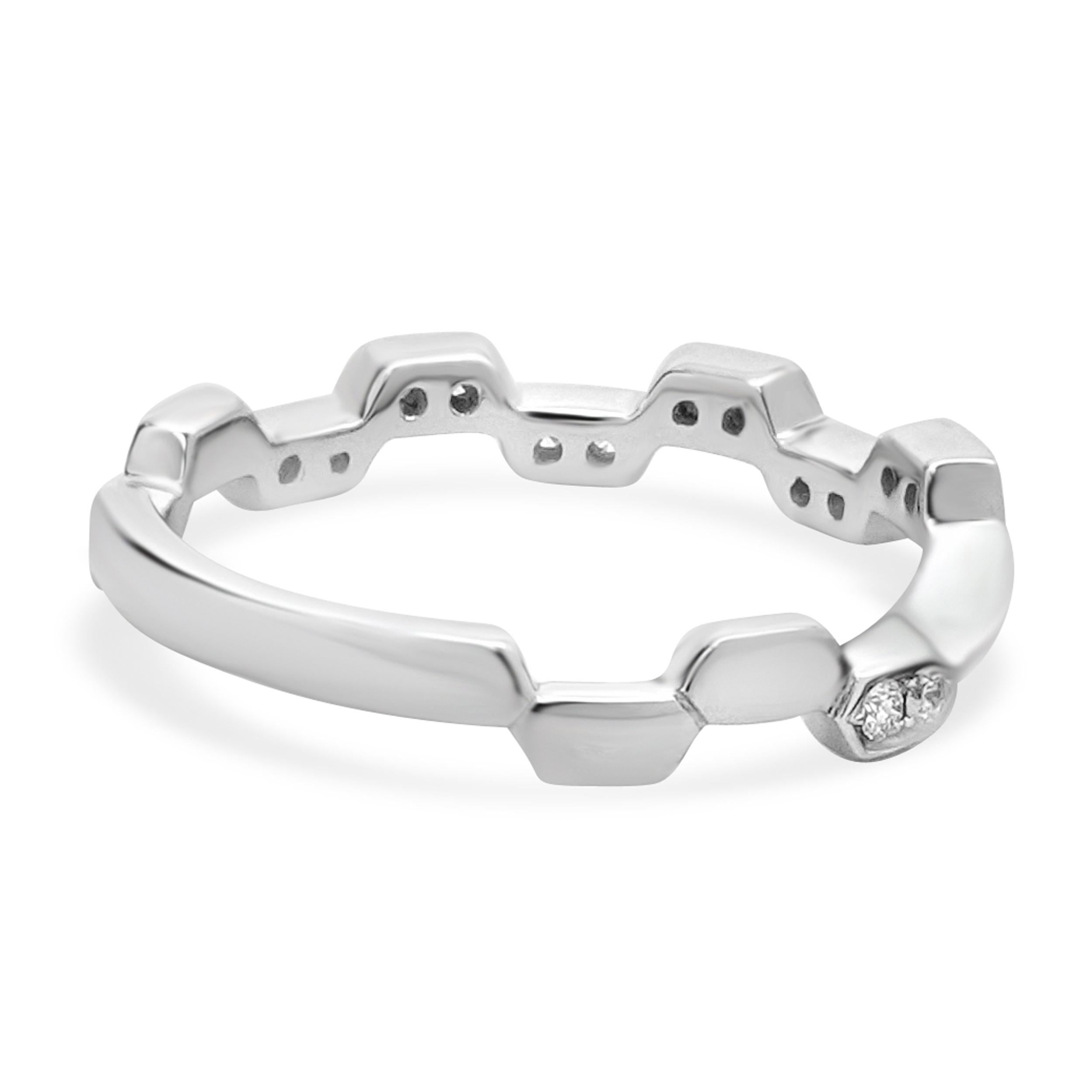 Designer: custom
Material: 14K white gold
Diamond: 18 round brilliant cut = 0.19cttw
Color: G
Clarity: SI1
Ring size: 7 (please allow two additional shipping days for sizing requests)
Weight: 2.16 grams
