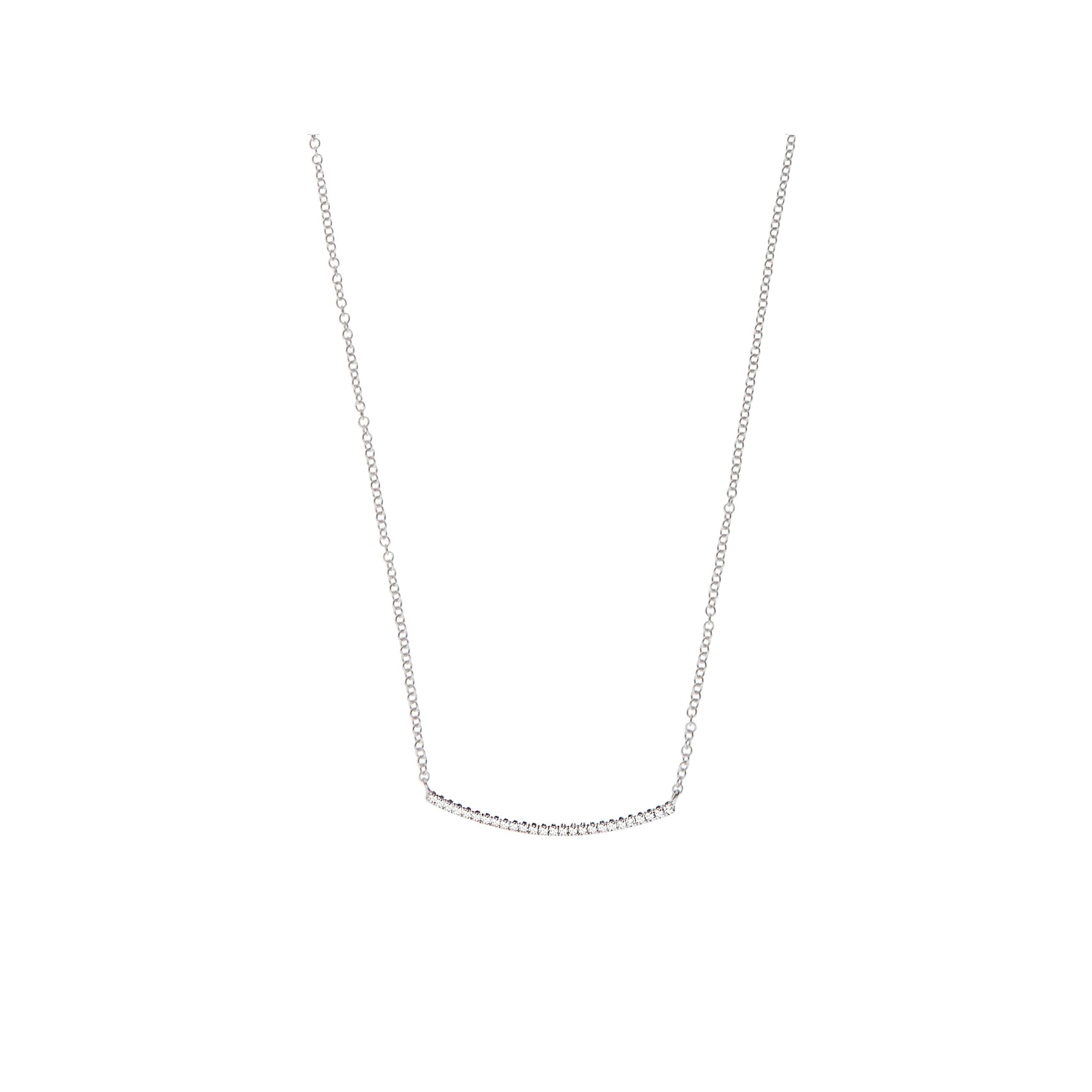 This Round Diamond Bar Chain Pendant is made in 14 karat White Gold, set with natural, colourless diamonds. With a total diamond carat weight (approximate) of 0.07 carat , The Diamonds are H colour, Si clarity. This pendant is 40cm long at its