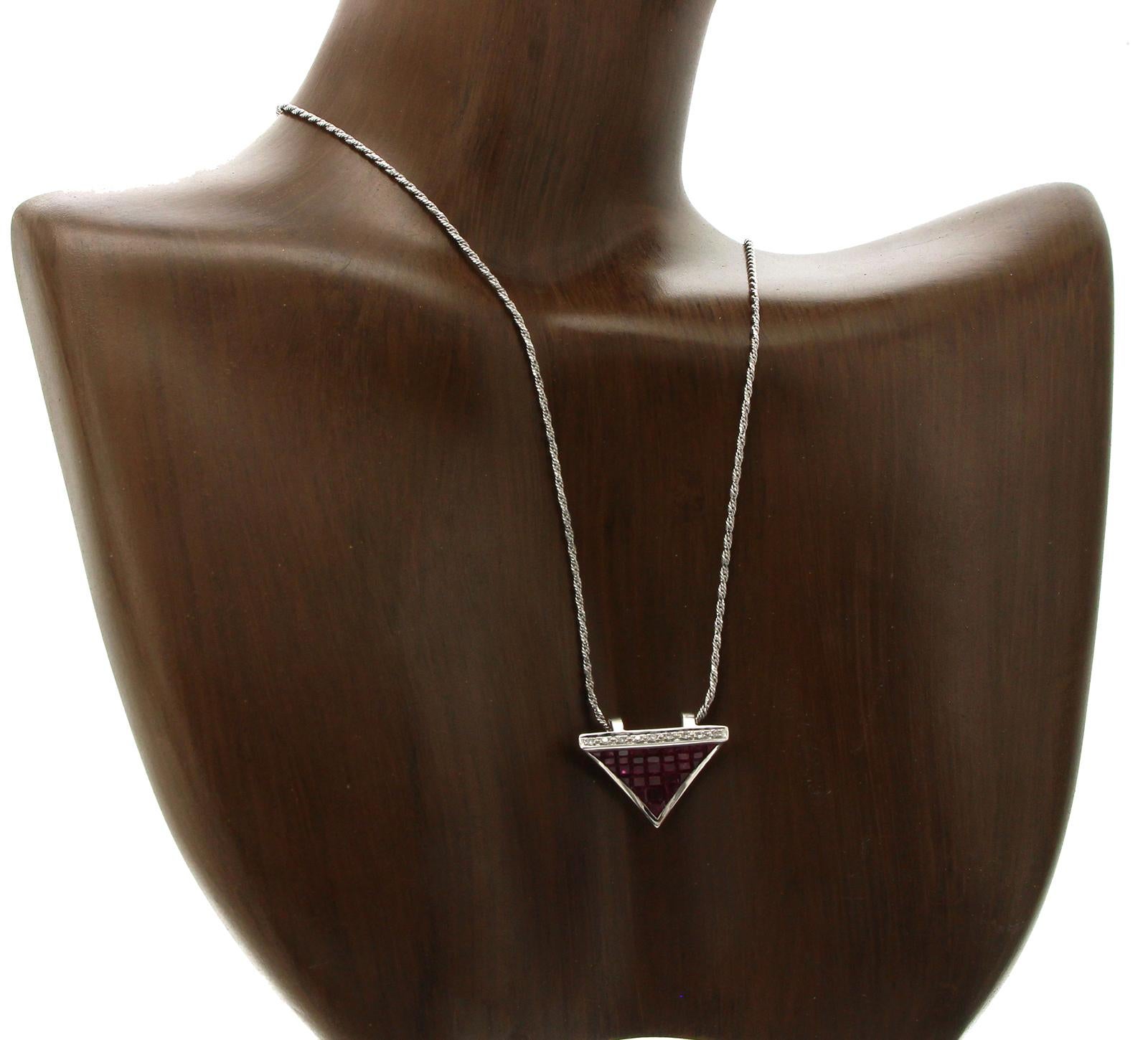 Women's 14 Karat White Gold 0.09 Carat Diamonds 2.90 Carat Invisible Set Ruby Necklace For Sale