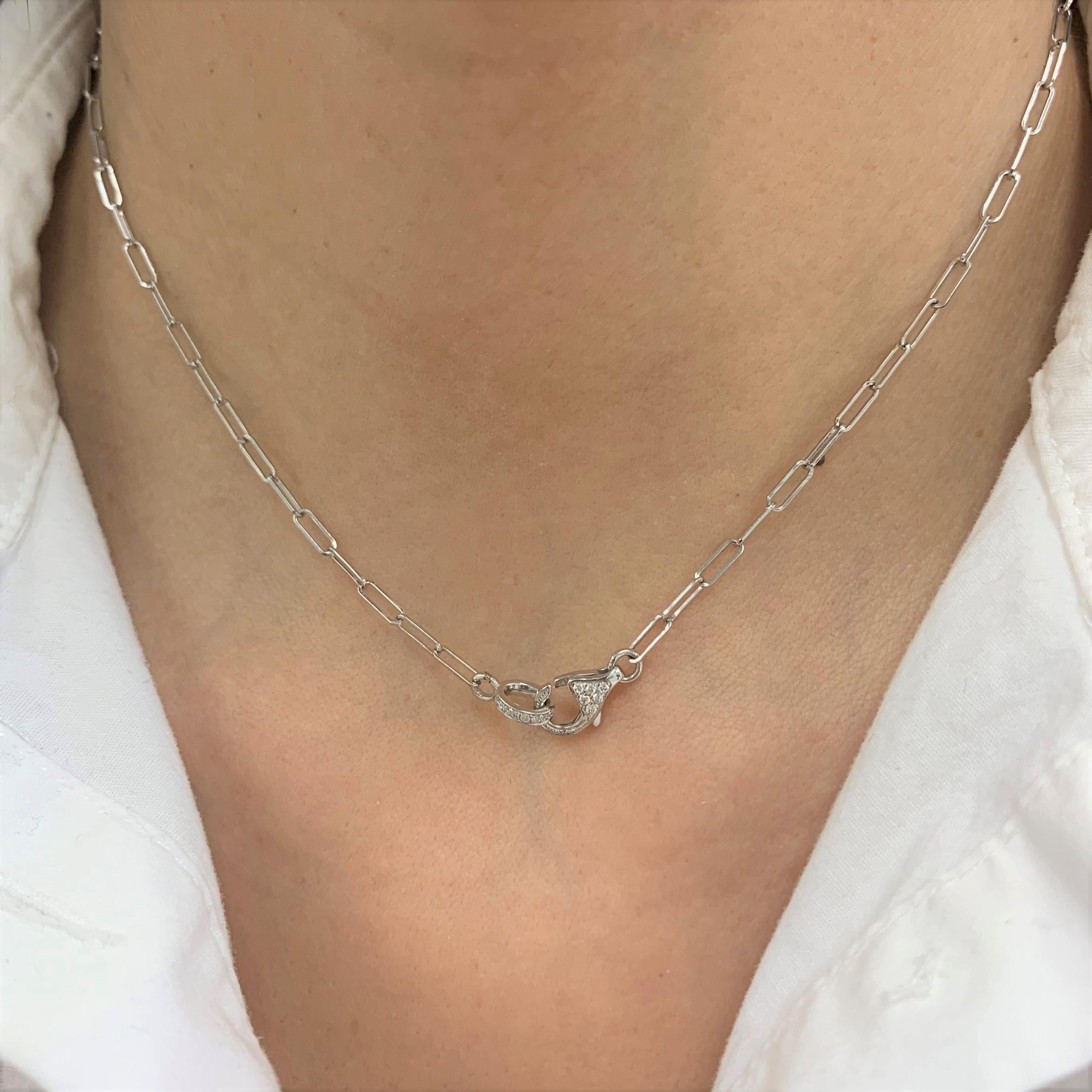 This beautiful 14k Gold Lobster Link Necklace features 0.13 ct of round natural Diamonds on both side of lock. 
-14K Gold
-0.13cts Natural White Diamonds
-Diamond Color GH
-Clarity SI1
-Lobster Link Necklace
-Gift Box Included