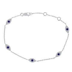 14 Karat White Gold 0.26 Diamond Sapphire Evil Eye Station Bracelet 7 inches