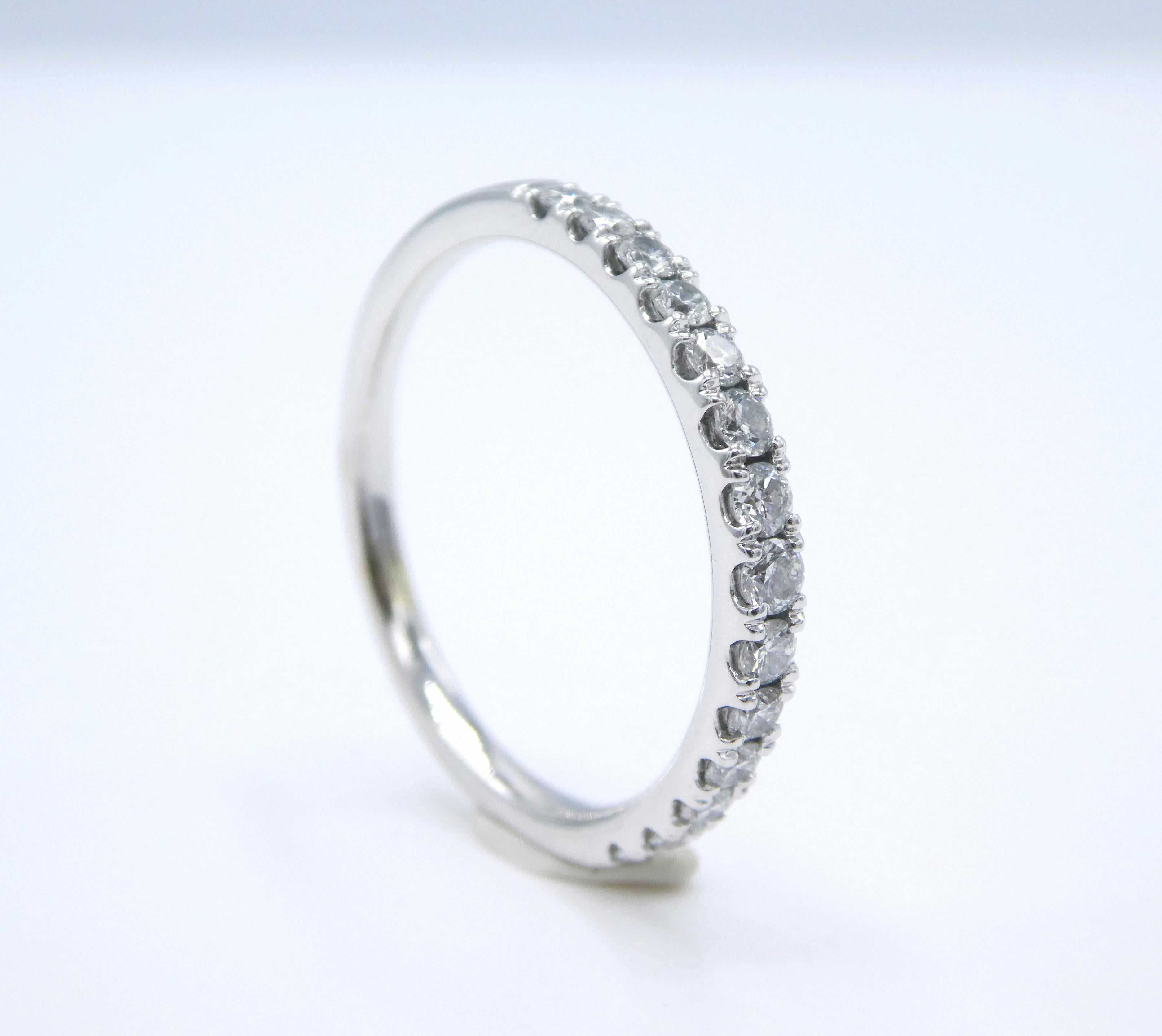 14K White Gold 0.33ctw 2.4mm Round Brilliant Cut Natural Diamond Band Ring Size 8.75

Metal: 14k White Gold
Diamonds: 14 Round brilliant cut natural diamonds, approx .33 CTW G-H SI
Weight: 3.11 grams
Band is 2.4mm wide
Size: 8.75 (8 3/4)
Markings: