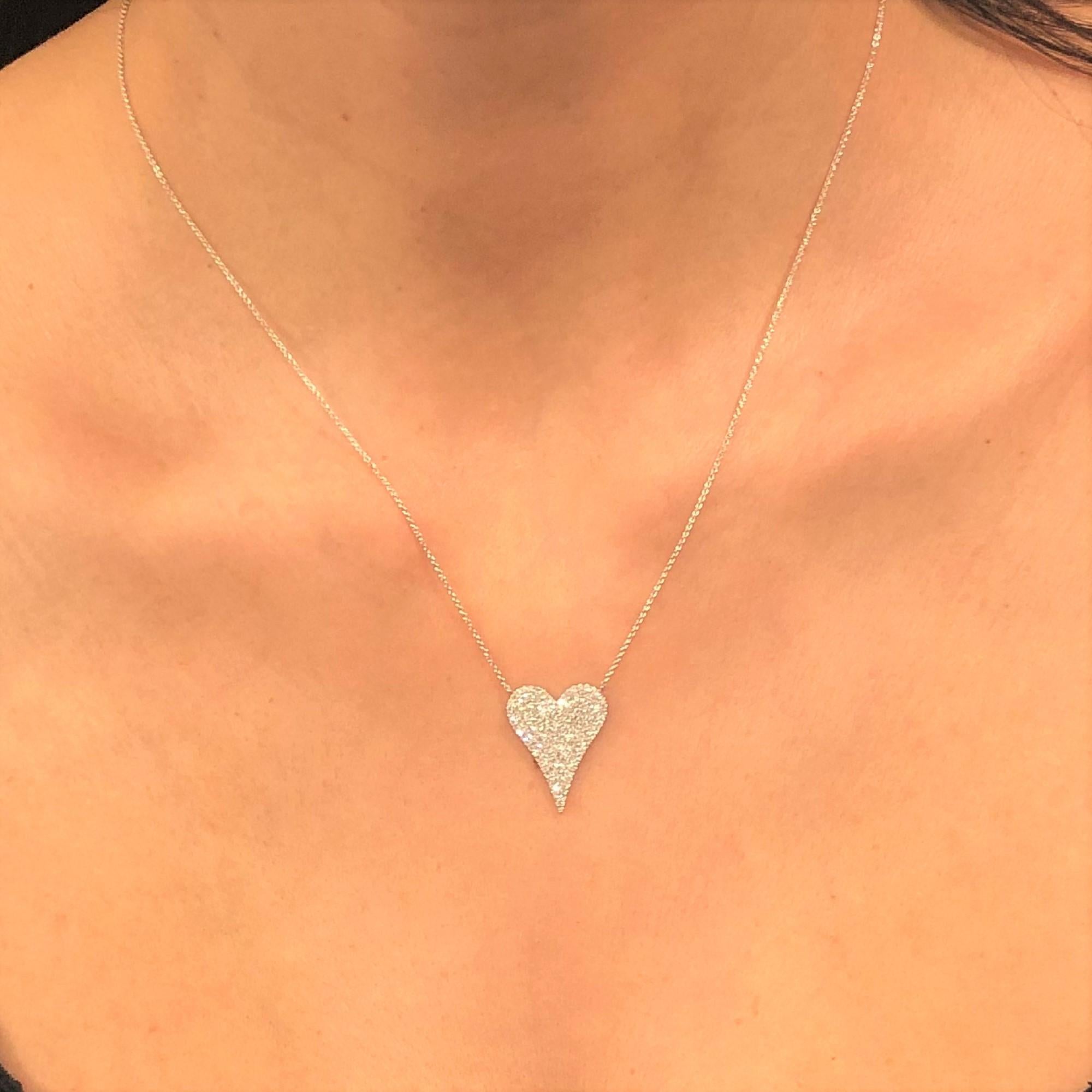 This Stunning & Exotic Pave Diamond Heart Pendant crafted of 14K White Gold features approximately 0.36Ct of Round Natural Diamonds, on a adjustable 16,17 & 18