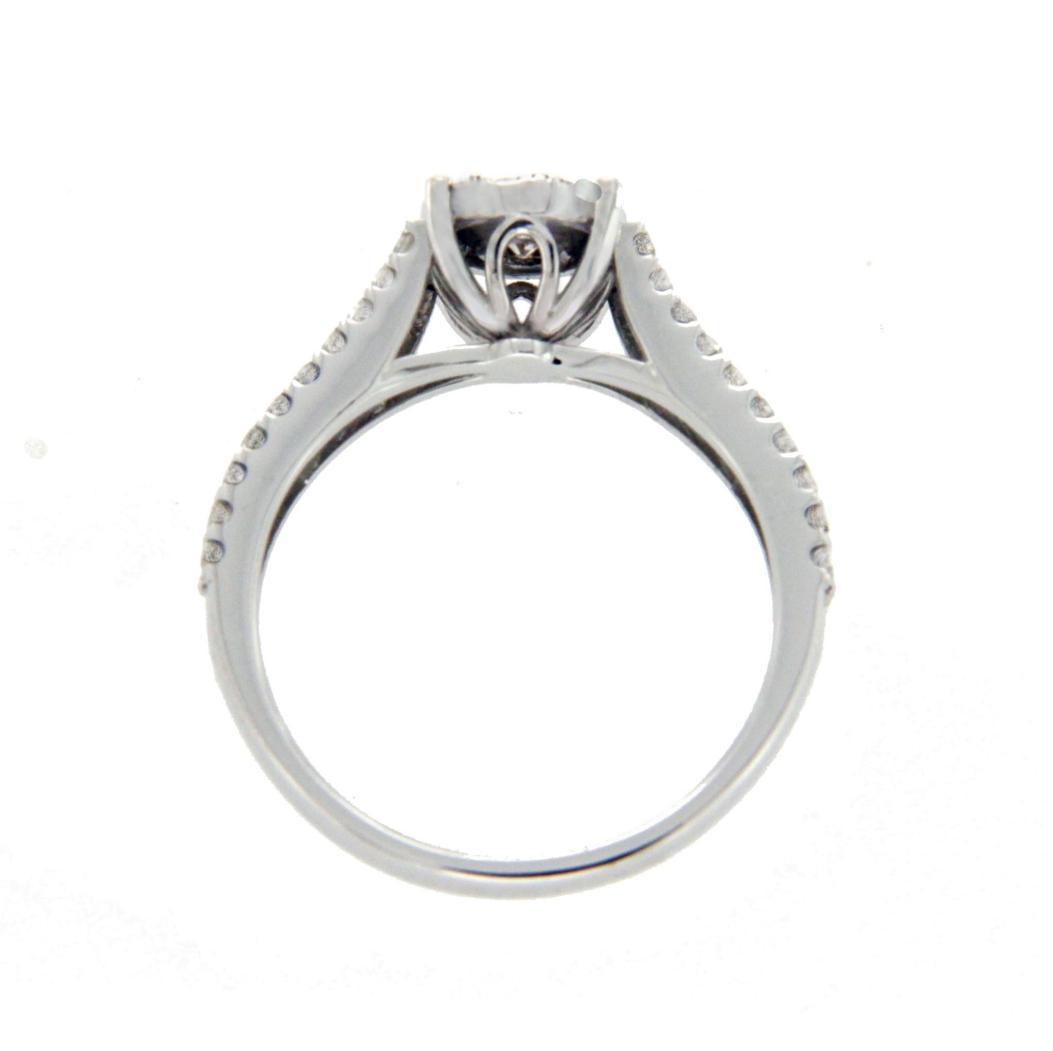 Type: Ring
Top: 7 mm
Band Width: 2.45 mm
Metal: White Gold 
Metal Purity: 14K
Hallmarks: 14K 
Total Weight: 3.2 Gram
Size: 7
Condition: New
Stone Type: 0.82 CT Diamonds