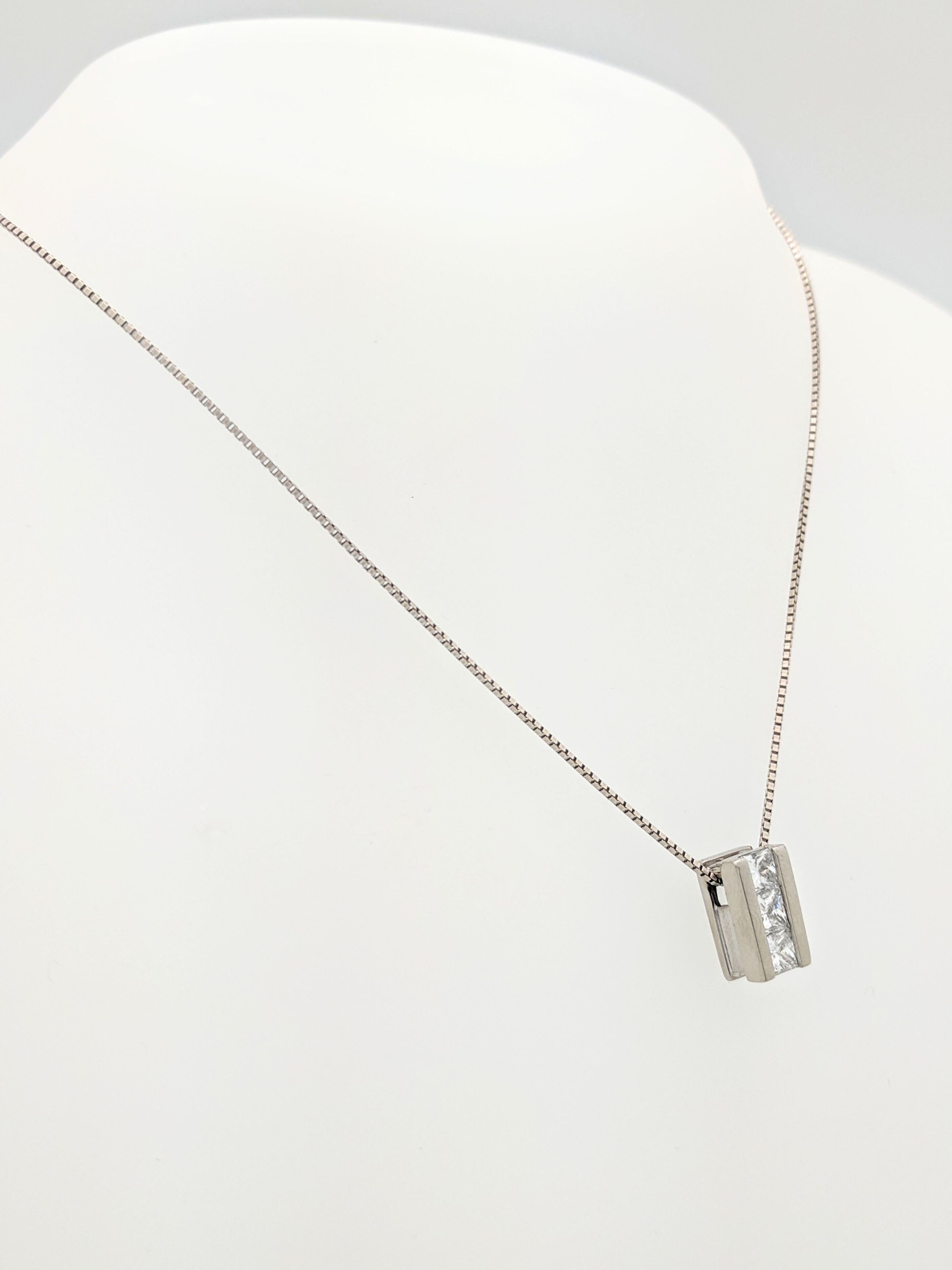 14K White Gold 1ctw Princess Cut Diamond Pendant Necklace

You are viewing a beautiful diamond pendant necklace.

This necklace is crafted from 14k white gold and weighs 5.8 grams. It features (3) .33ct princess cut diamonds for an estimated 1ctw.