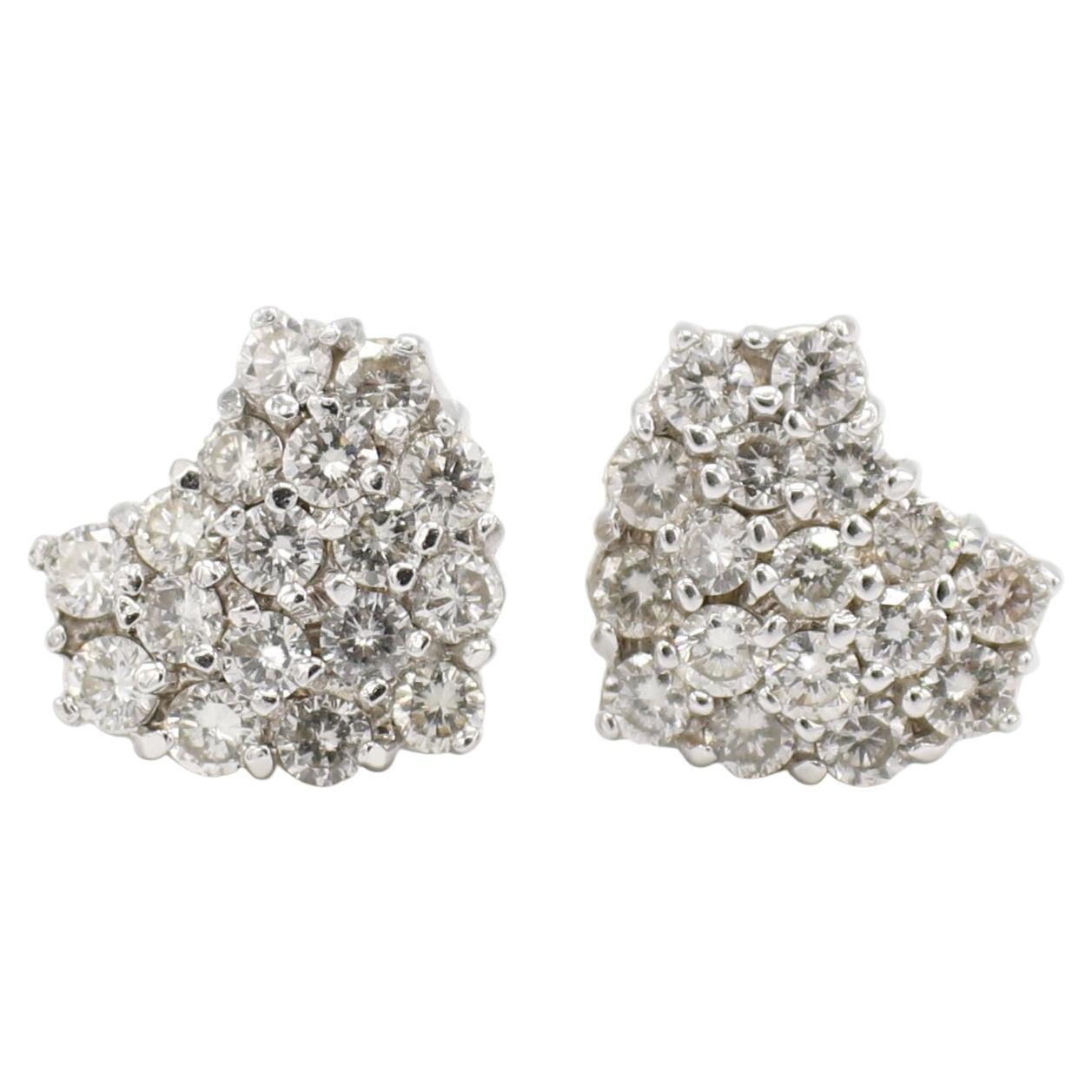 14 Karat White Gold 1.00 Carat Pavé Heart Natural Diamond Cluster Stud Earrings 
Metal: 14k white gold
Weight: 3.64 grams
Diamonds: Approx. 1.00 carat G-H VS round natural diamonds
Dimensions: 10 x 11mm
Backs: Push backs
