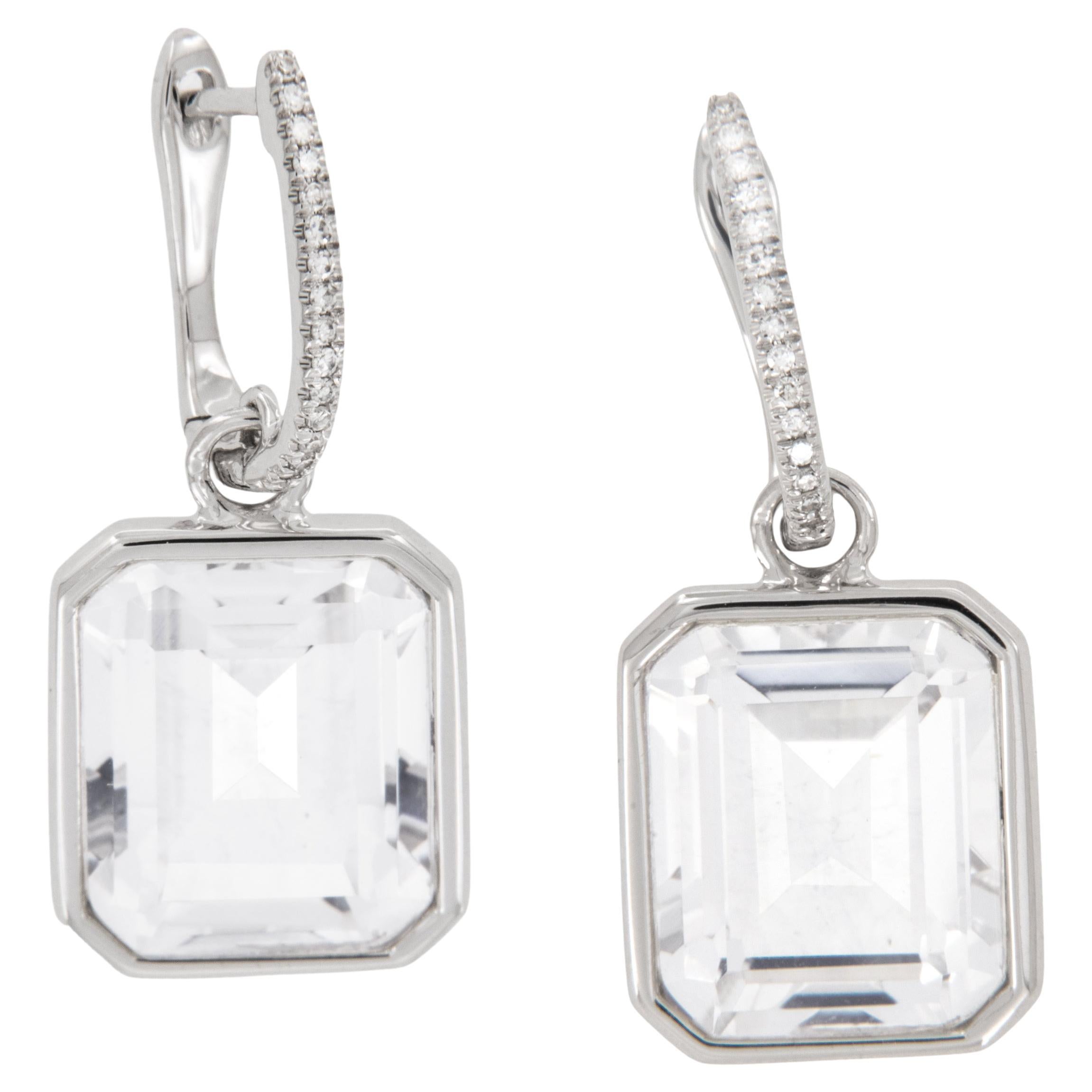 Rock crystal has been adorned in jewelry for centuries! The Greek word krystallos meaning “ice”, provides the basis for the origin of the name Rock Crystal. These stunning drop earrings feature two emerald cut crystals perfectly 