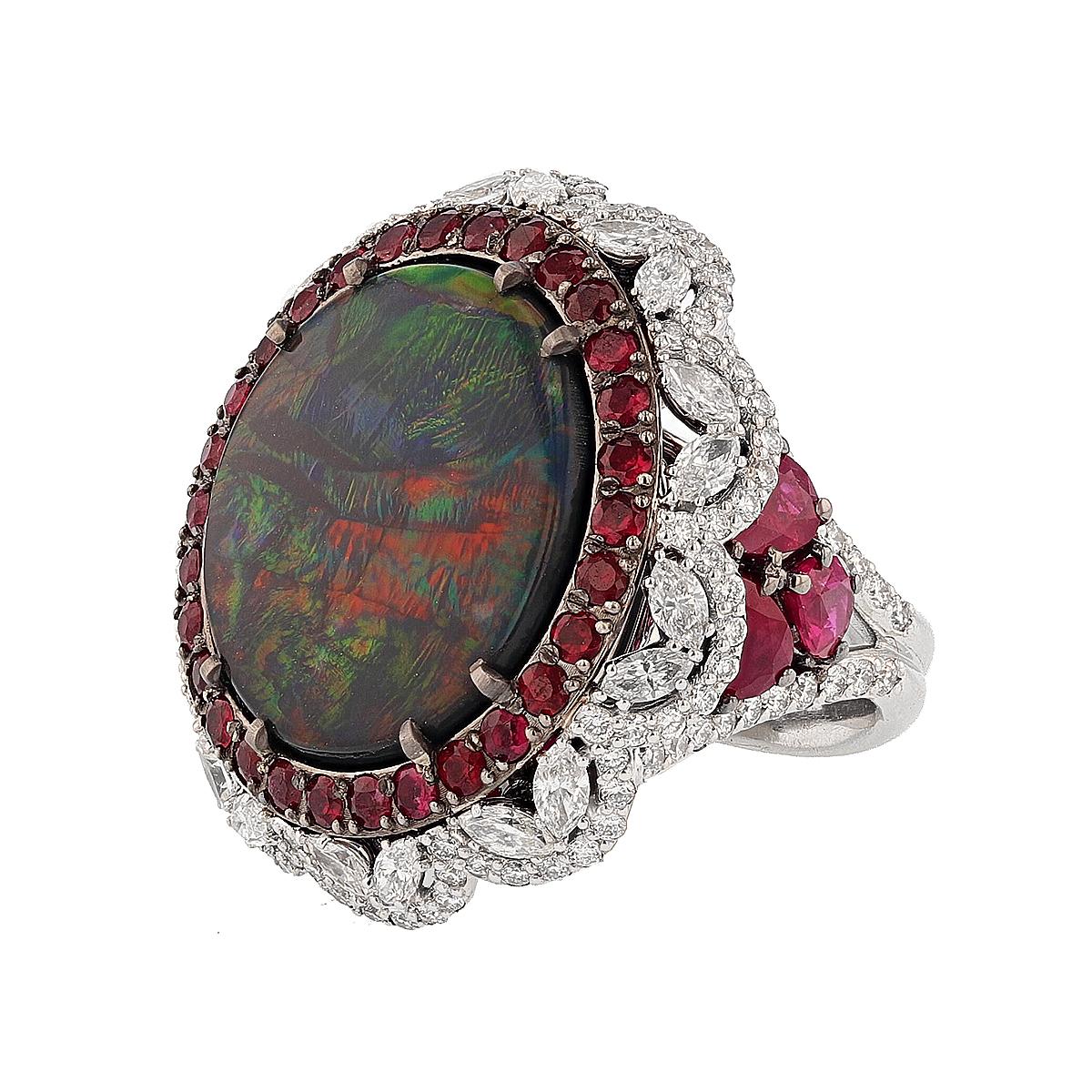 This ring is made with 14 karat white gold and features an 11.11ct  GIA  certified Australian Black Opal (GIA Certificate number: 5202388982) with a mixture of colors like red, orange, green, and blue and is surrounded by 121 prong set round cut