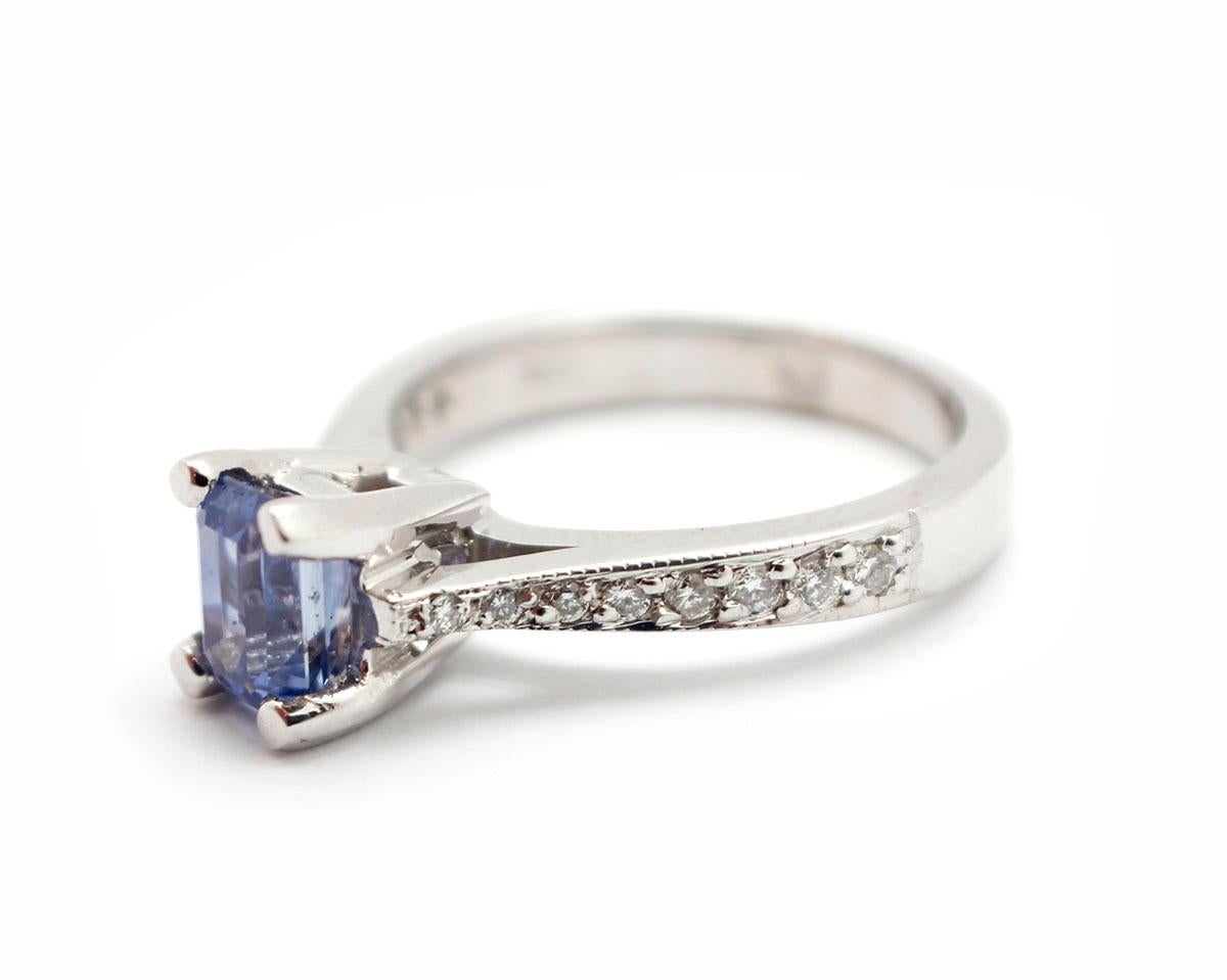 This beautiful ring features a 1.31-carat Ceylon sapphire set into a 14k white gold ring. The sapphire is accented by round diamonds for an additional weight of 0.16ct. The ring measures 7mm wide, and it weighs 4.7 grams. It is size 7.
