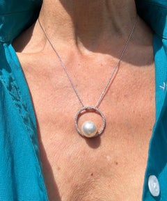 14 Karat White gold 13mm South Sea Pearl-.75ct Diamond Circle Pendant