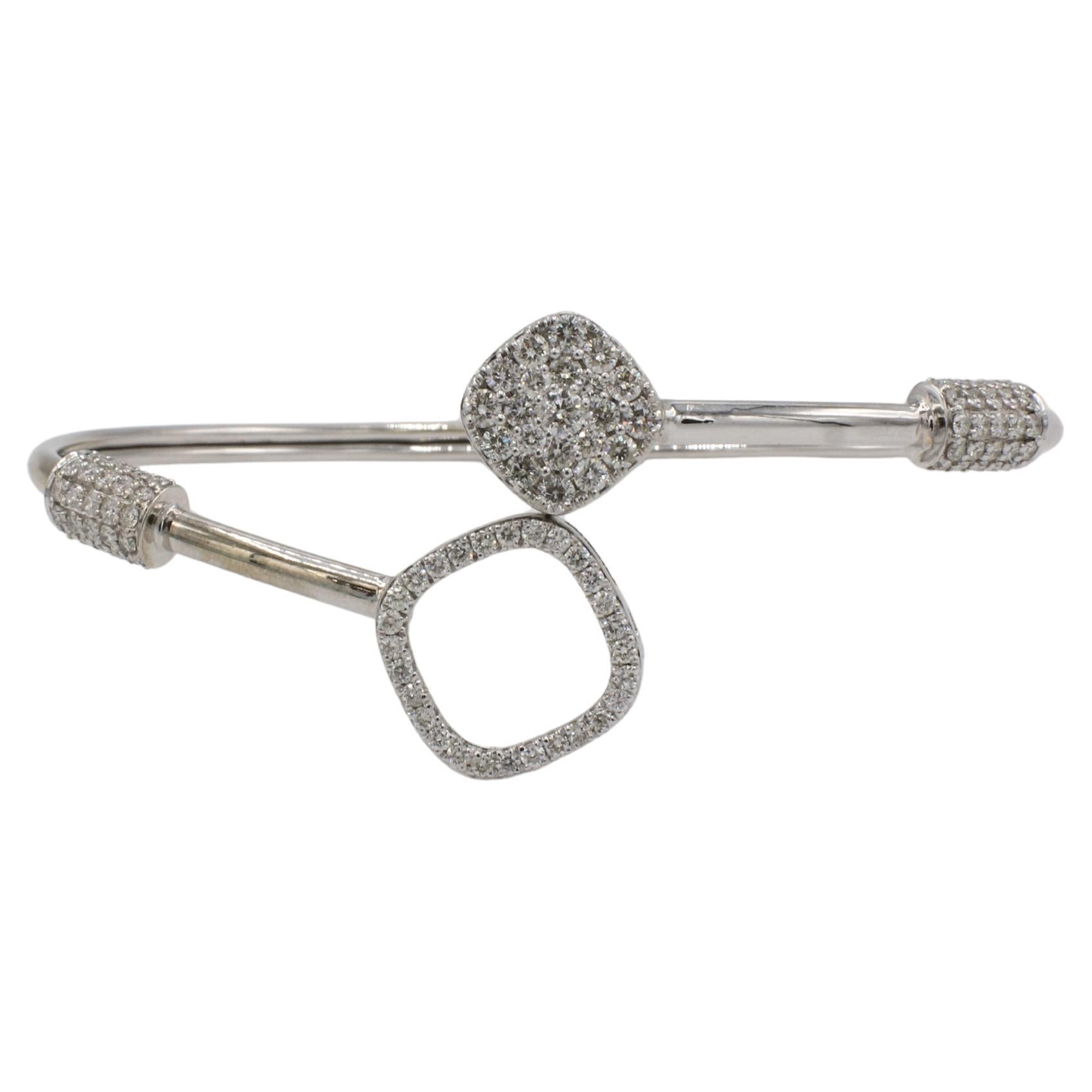 14 Karat White Gold 1.50 Carat Natural Diamond Bangle Bracelet 
Metal: 14k white gold
Weight: 7.90 grams
Diamonds: 1.50 CTW round G-H VS natural diamonds
Size: Fits up to a 6.5 inch wrist clasped
Width: 2.5 - 15mm
SDD F35000223
