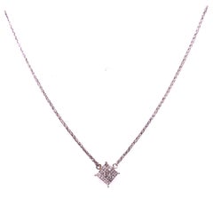 Collier en or blanc 14 carats avec pendentif en diamants