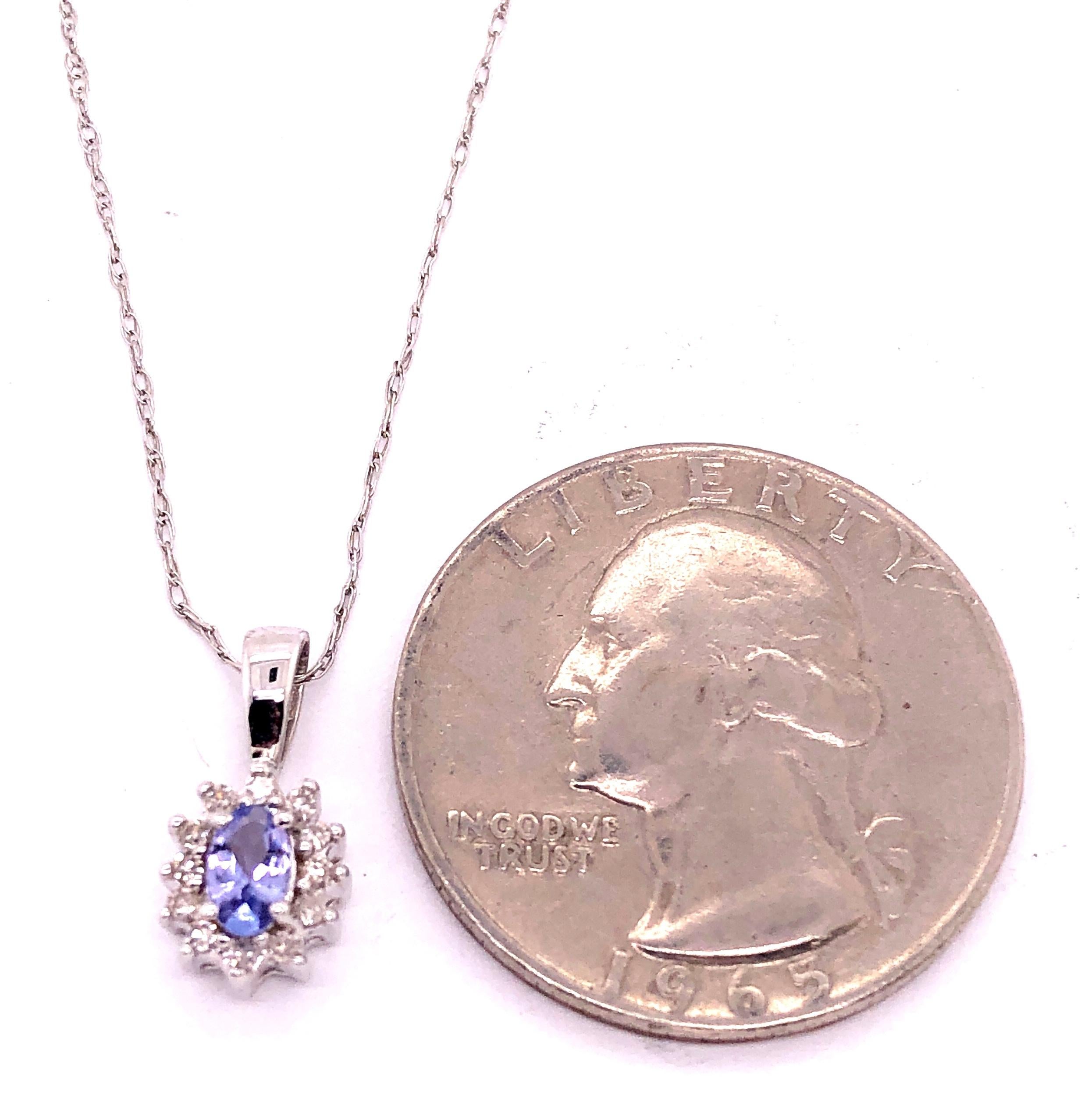 14 Karat White Gold Necklace with Diamonds and Oval Tanzanite Pendant For Sale 5
