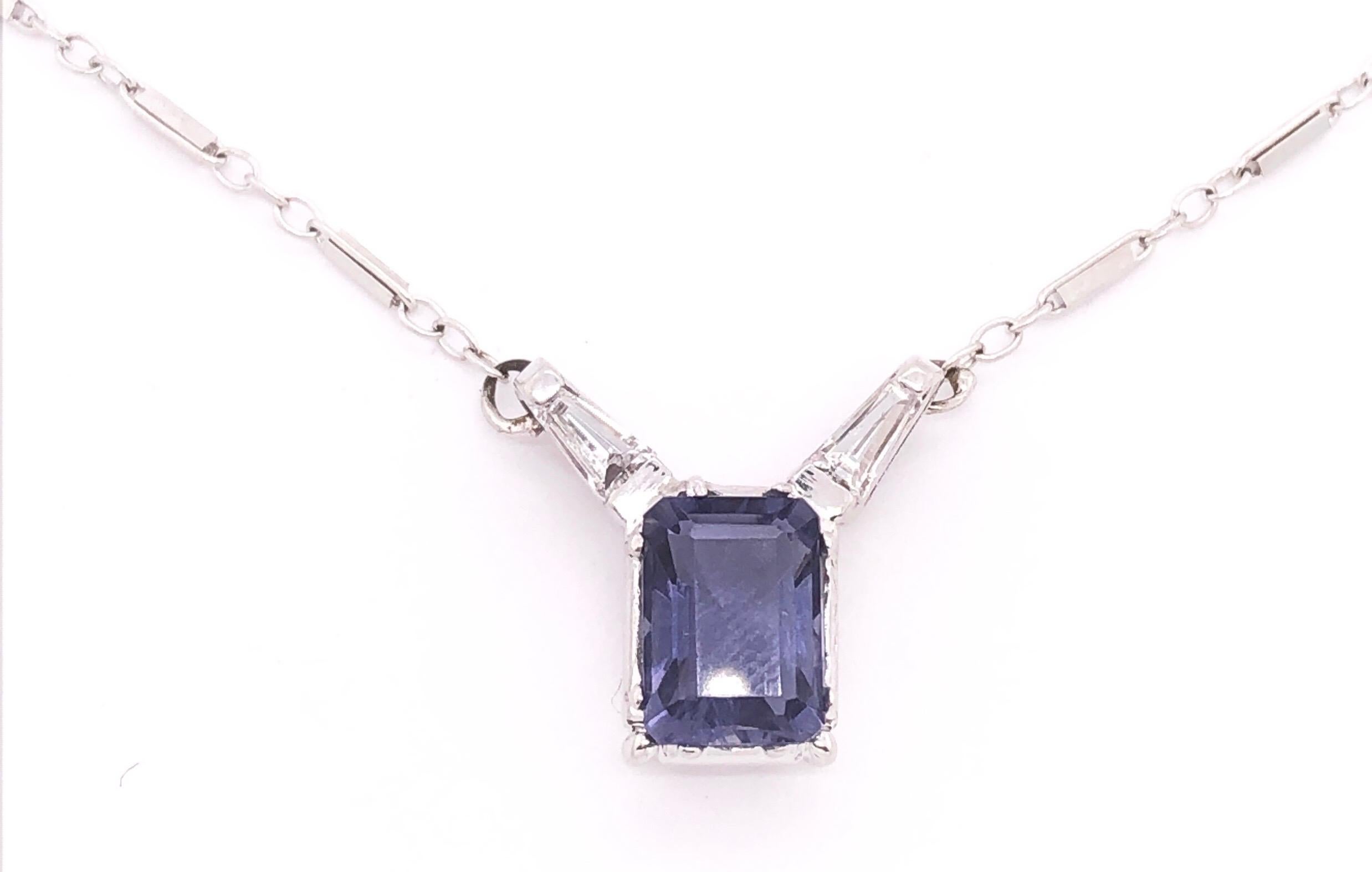 14 Karat White Gold 16 Inch Pendant Necklace with One Square Cushion Tanzannite and Baguette Diamonds
0.25 total diamond weight.
3.48 grams total weight.