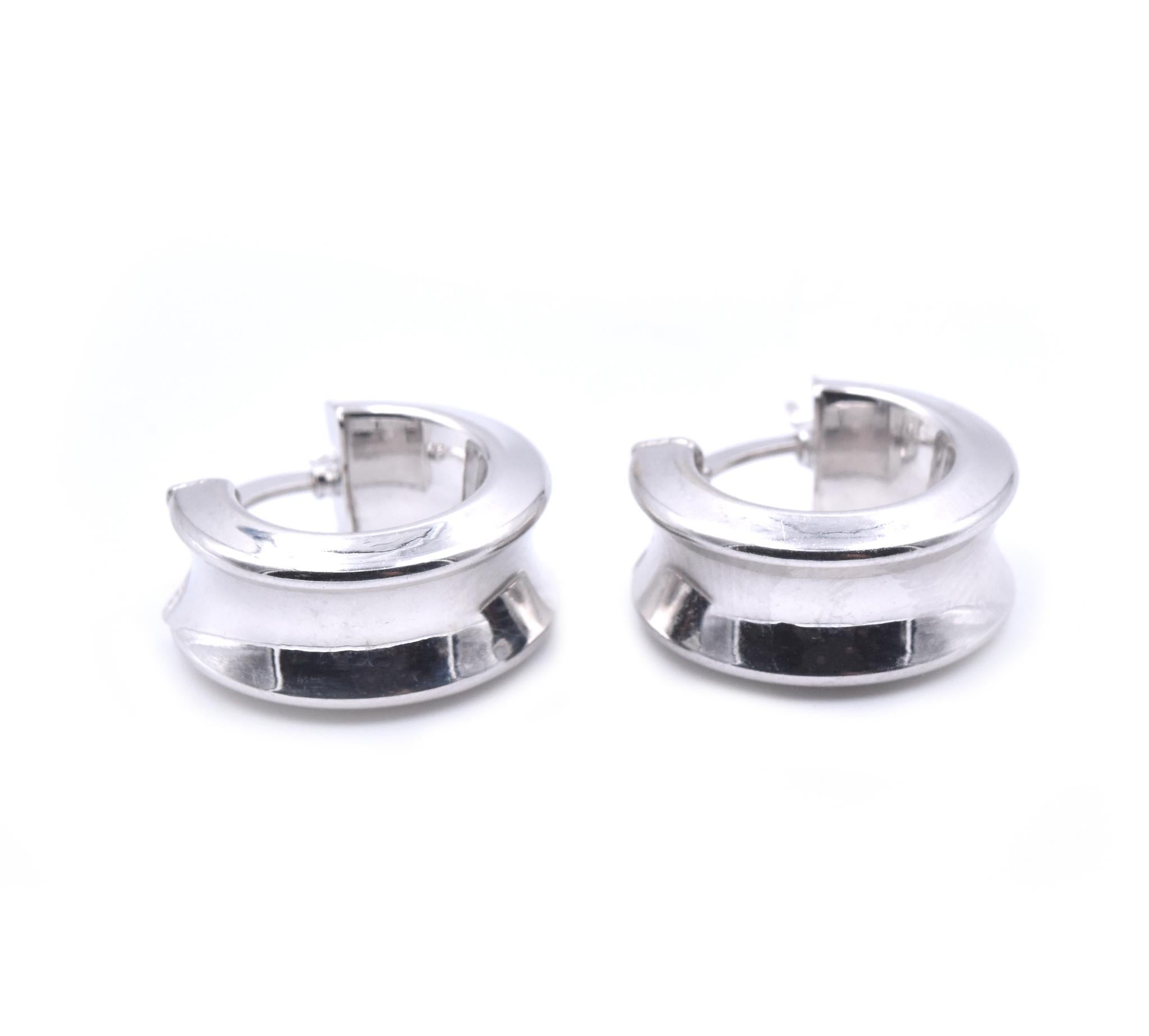 Designer: custom
Material: 14k white gold
Dimensions: earrings measure 16.8mm in diameter
Fastenings: snap backs
Weight: 2.57 grams