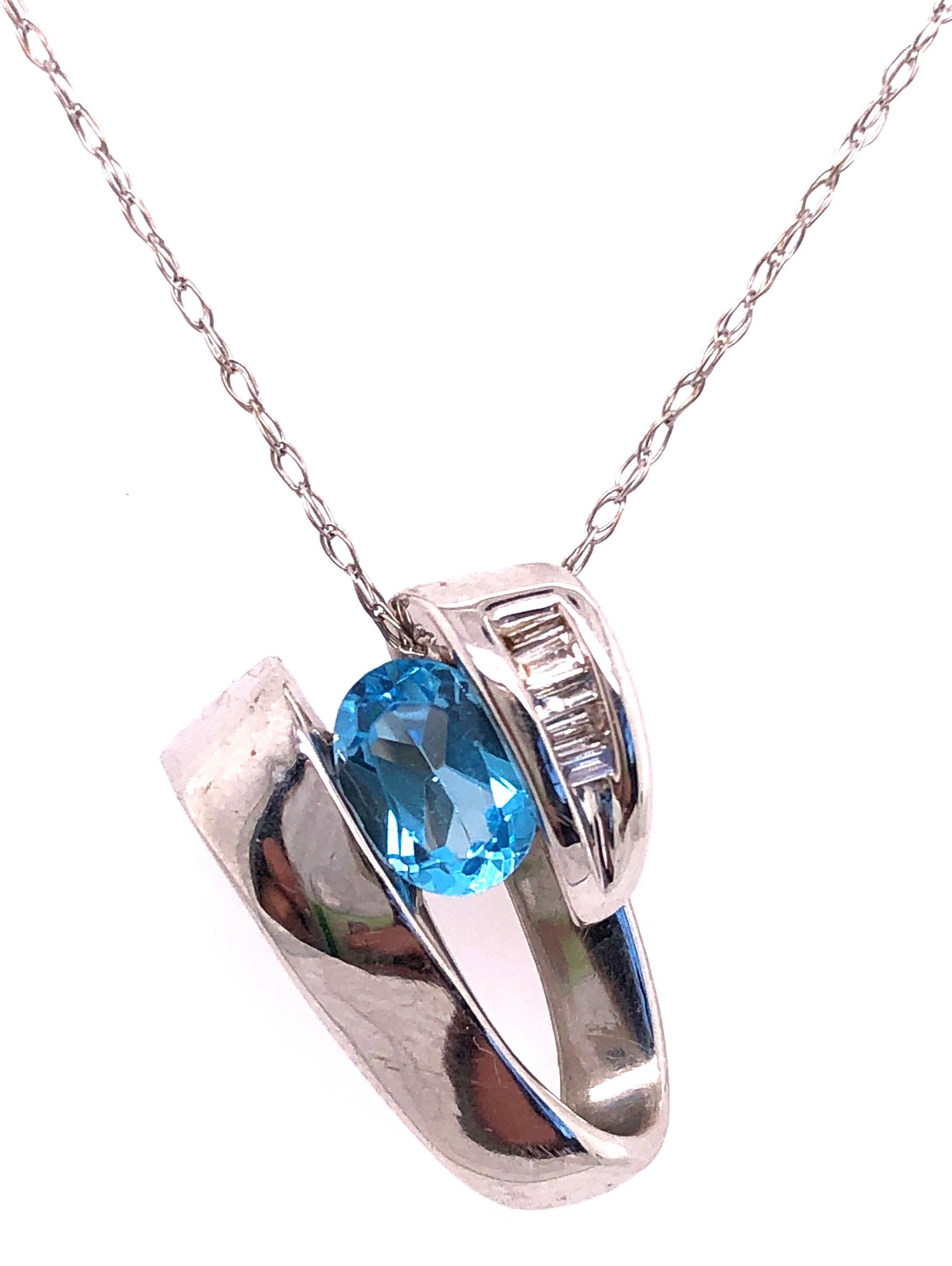 da uomo o donna A Link in oro bianco 14 carati con topazio blu ovale e diamanti baguette in vendita