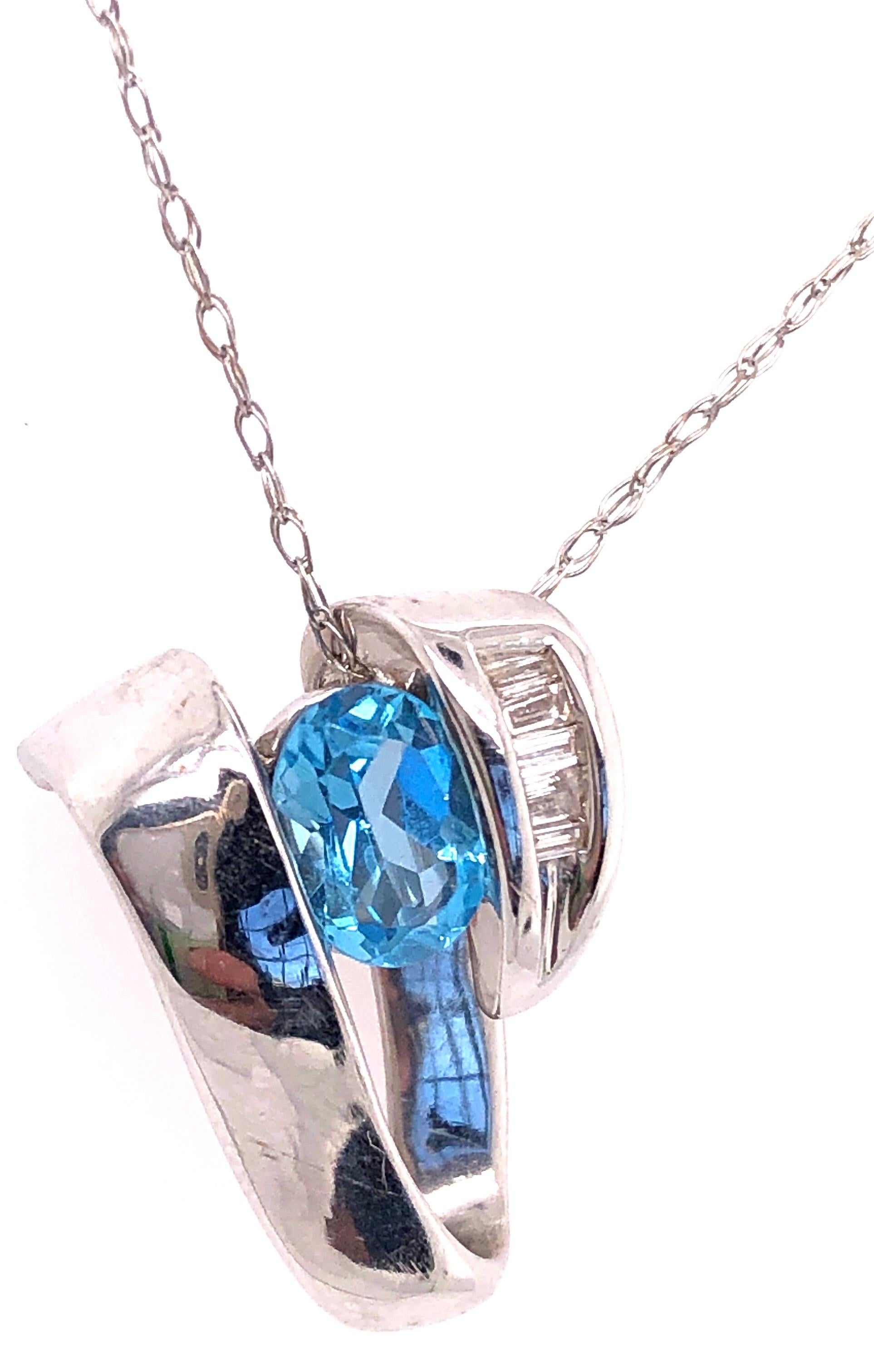 A Link in oro bianco 14 carati con topazio blu ovale e diamanti baguette in vendita 1