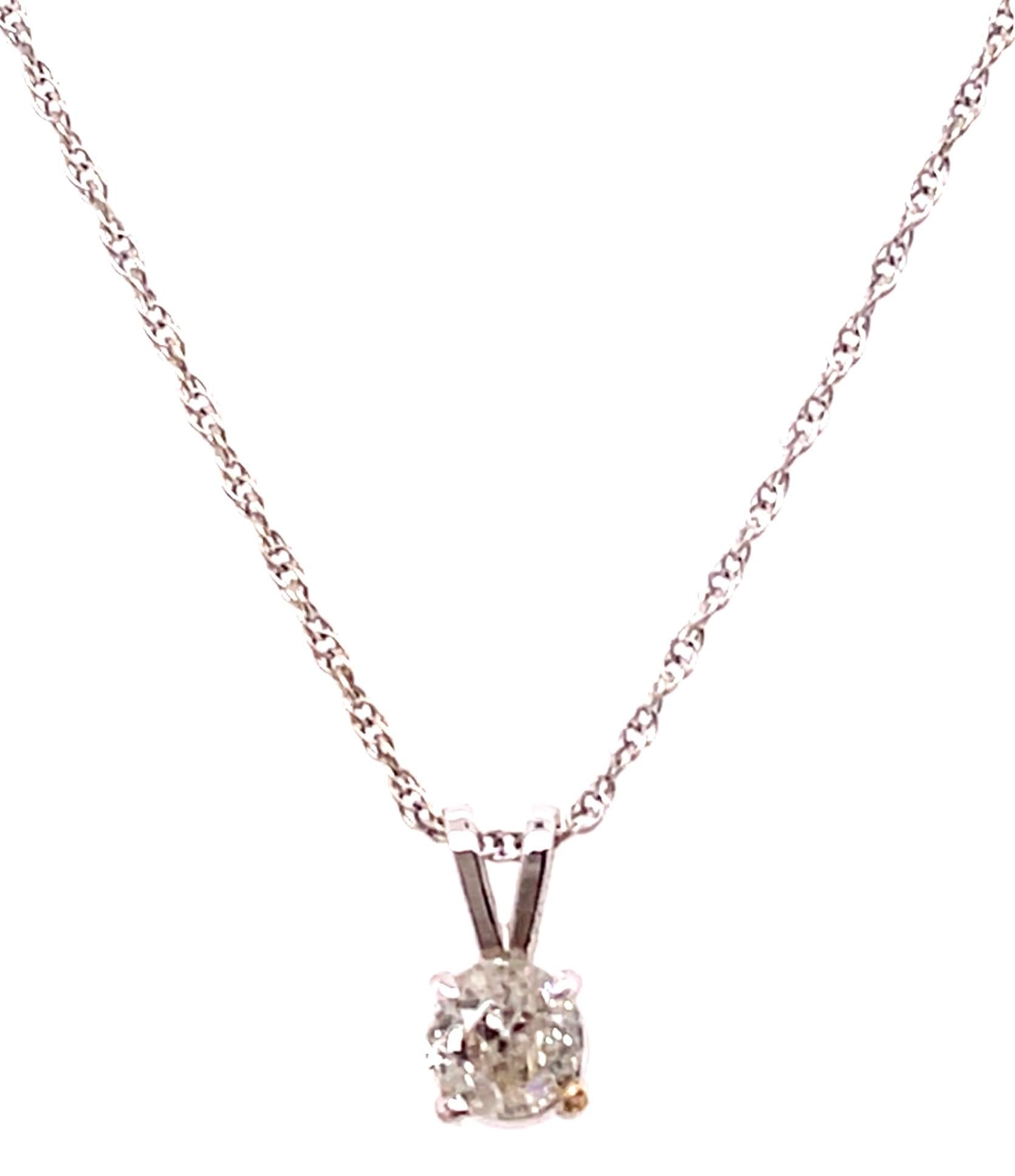 14 Karat White Gold 18 Inch Fancy Necklace with Diamond Round Pendant.
0.50 total carat weight
1.45 grams total weight.
