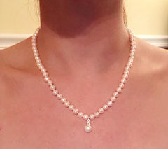 14 Karat White Gold 18 Inch Pearl Necklace with Round Diamonds