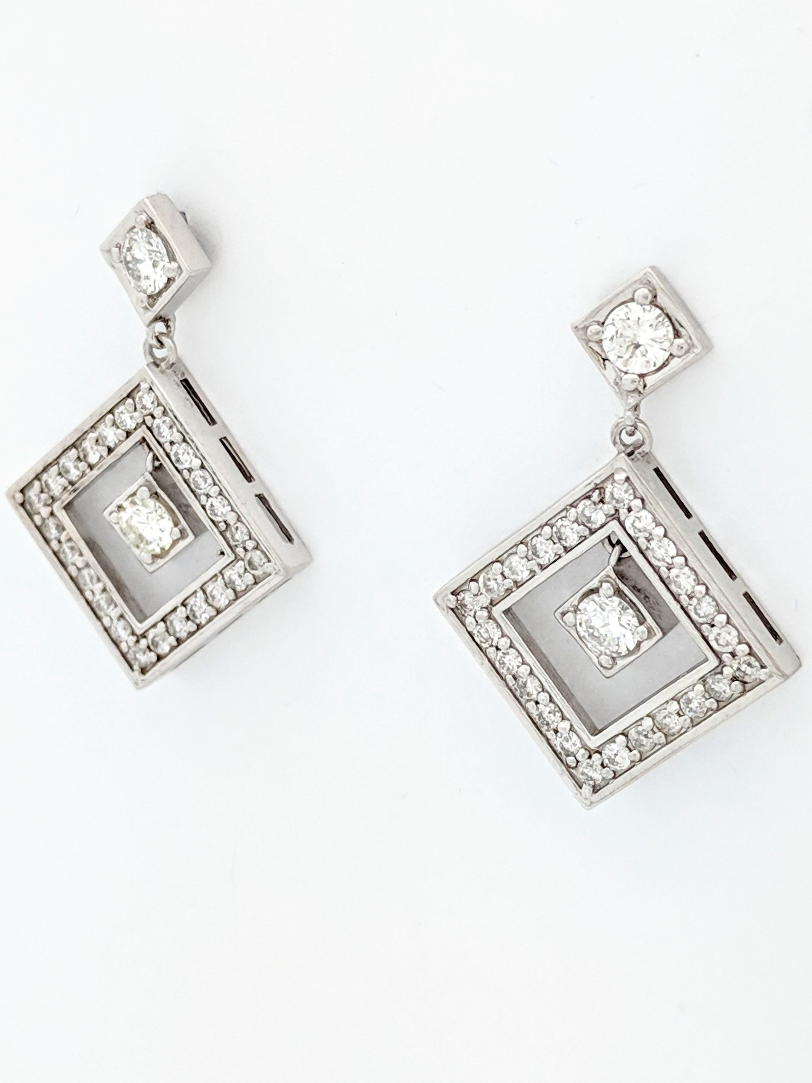 Round Cut 14 Karat White Gold 1.80 Carat Diamond Dangle/Drop Earrings SI2/H For Sale